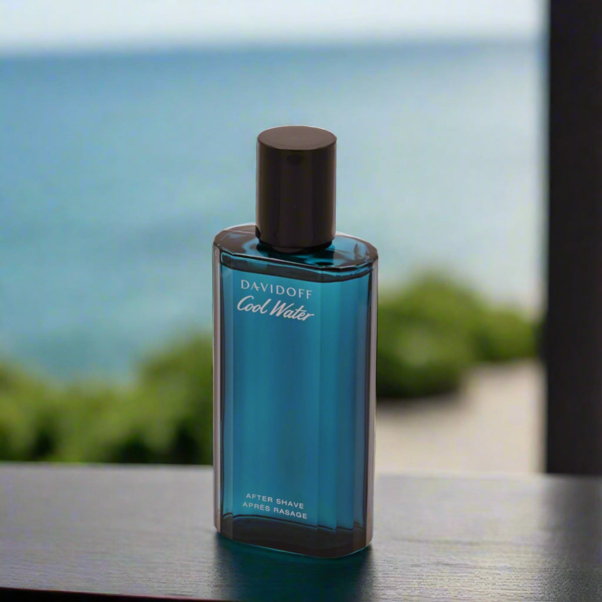 Blue Davidoff Cool Water after shave bottle on a white background