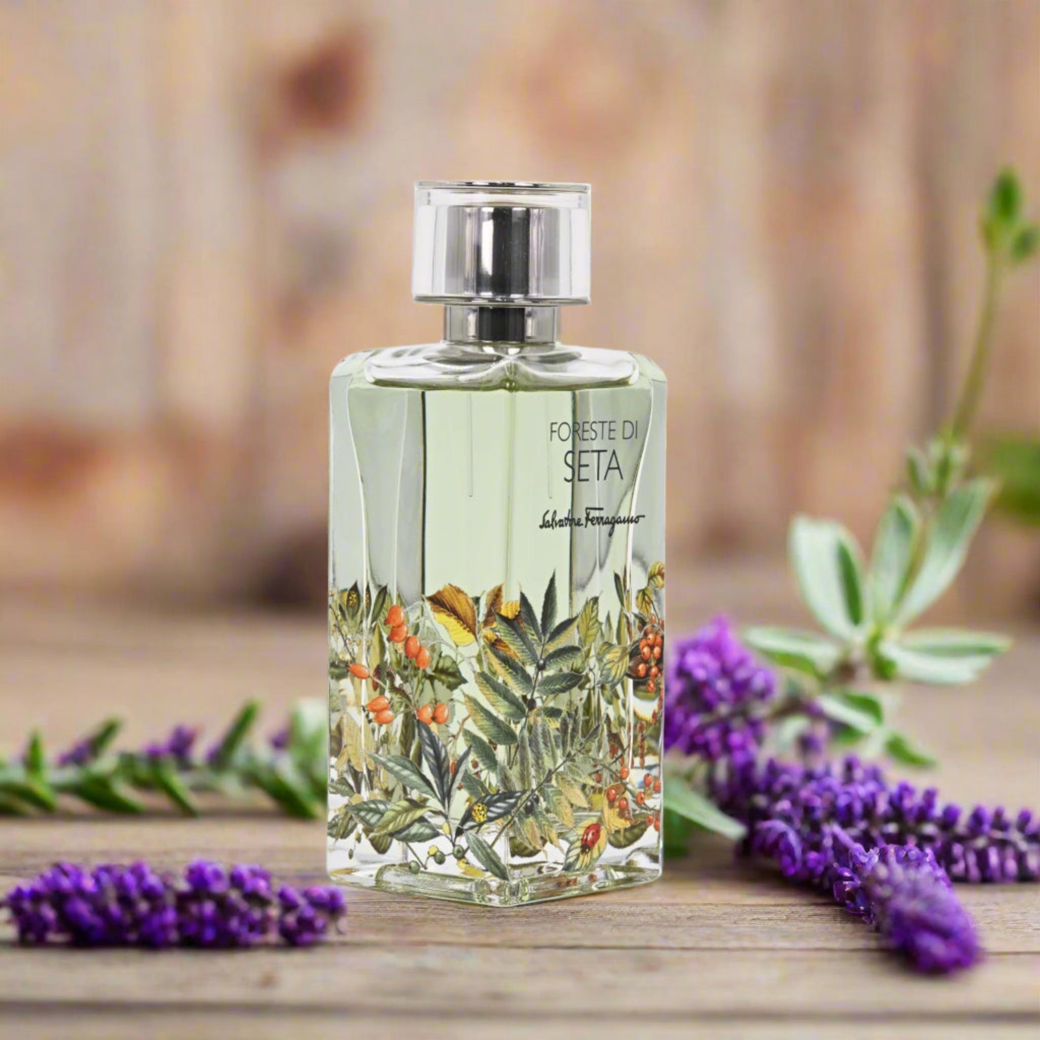 Perfume bottle with botanical design on a wooden surface with lavender flowers
