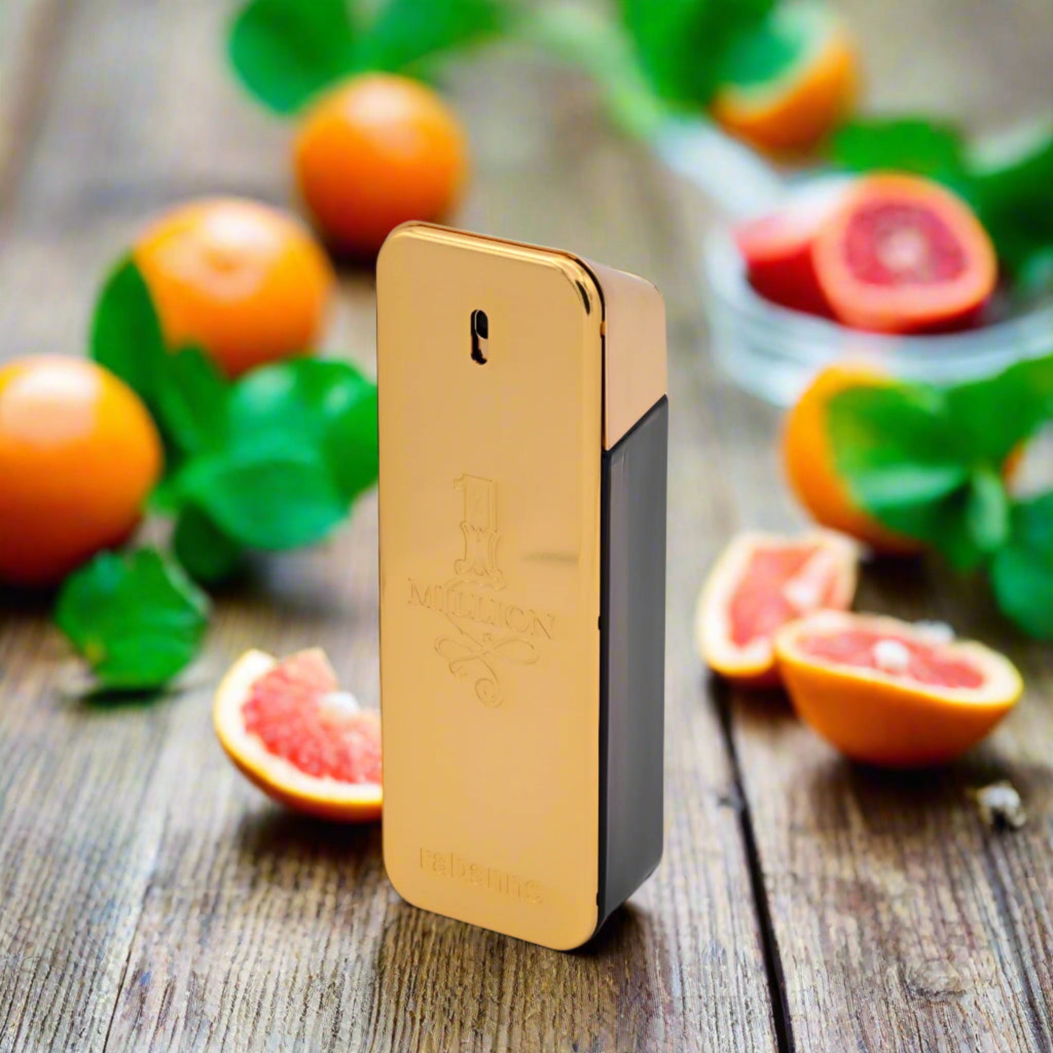 Gold and black electronic device on a wooden surface with fruits in the background
