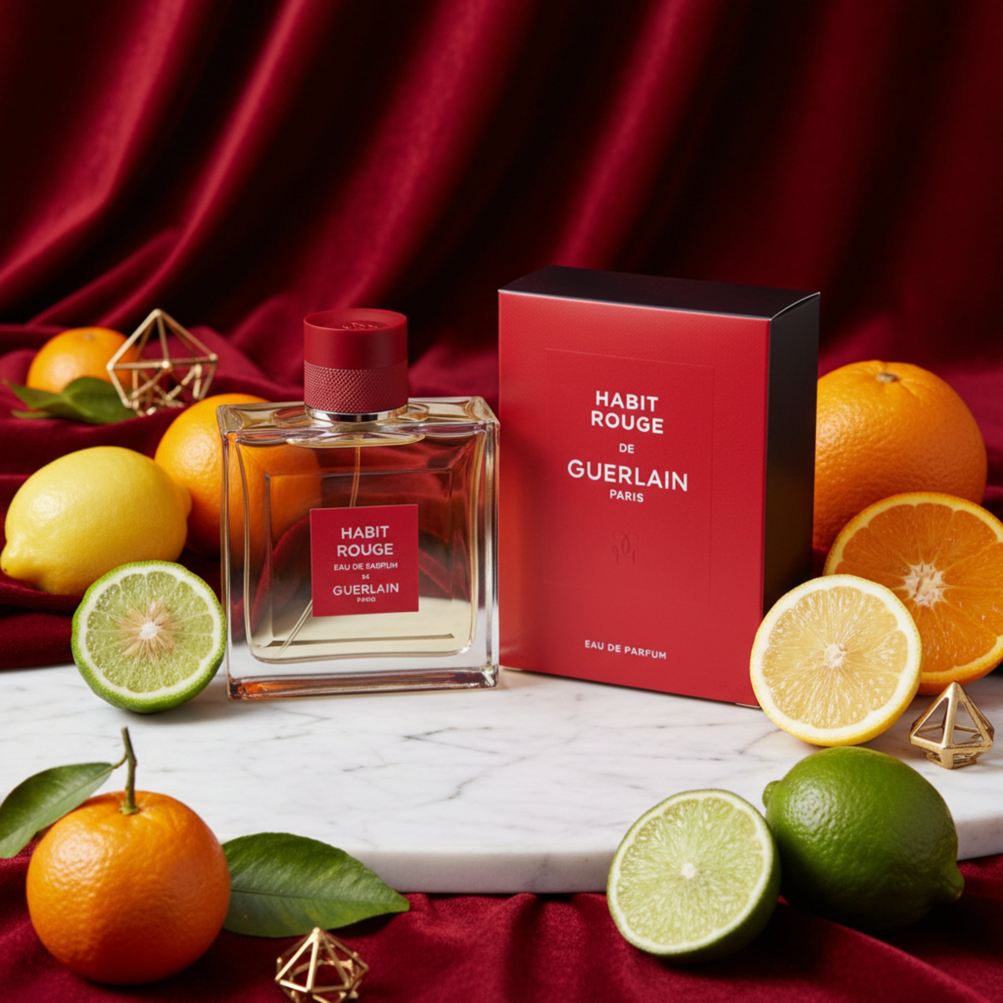 Habit Rouge Guerlain perfume bottle and packaging on a white background