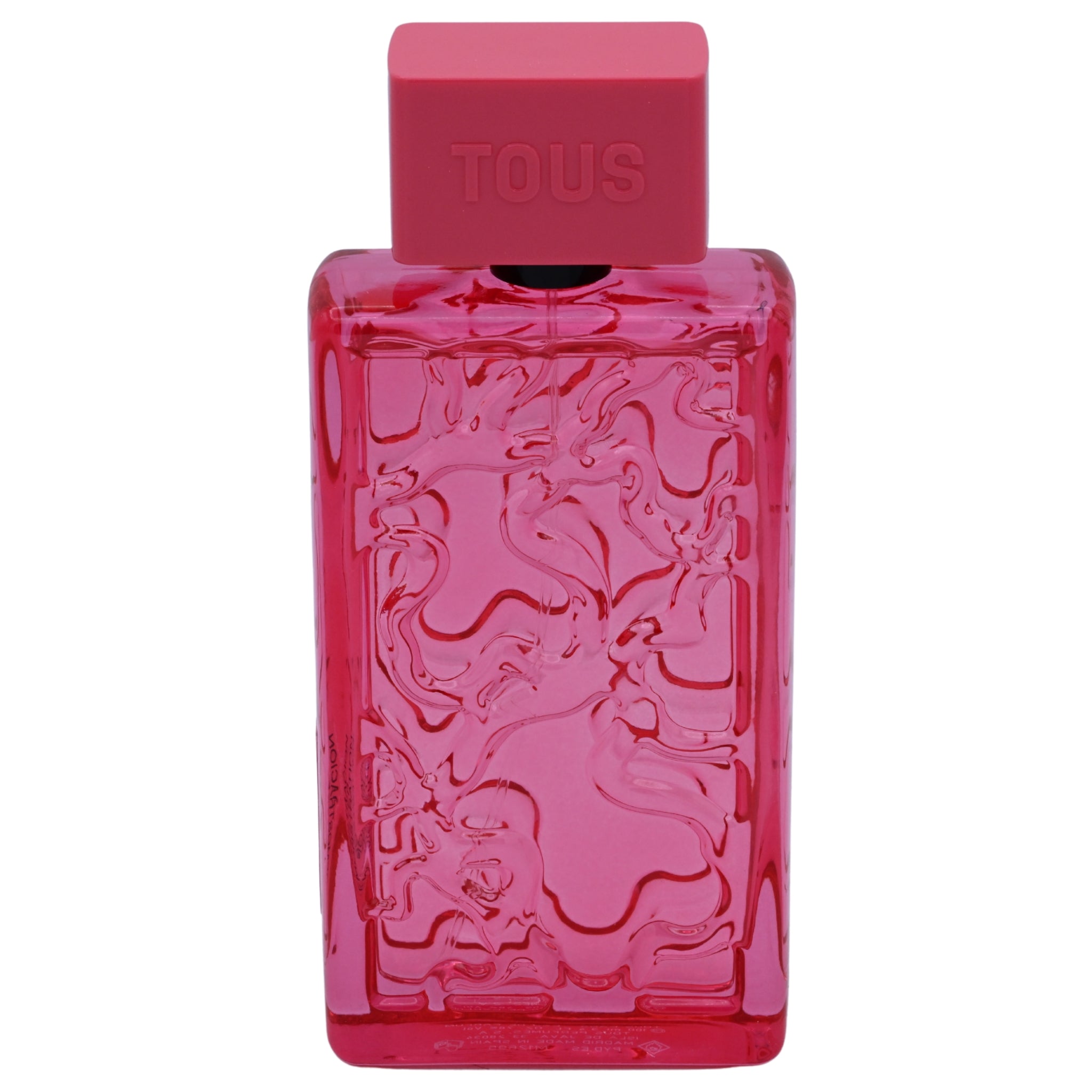 Pink perfume bottle with 'Tous' branding on a white background