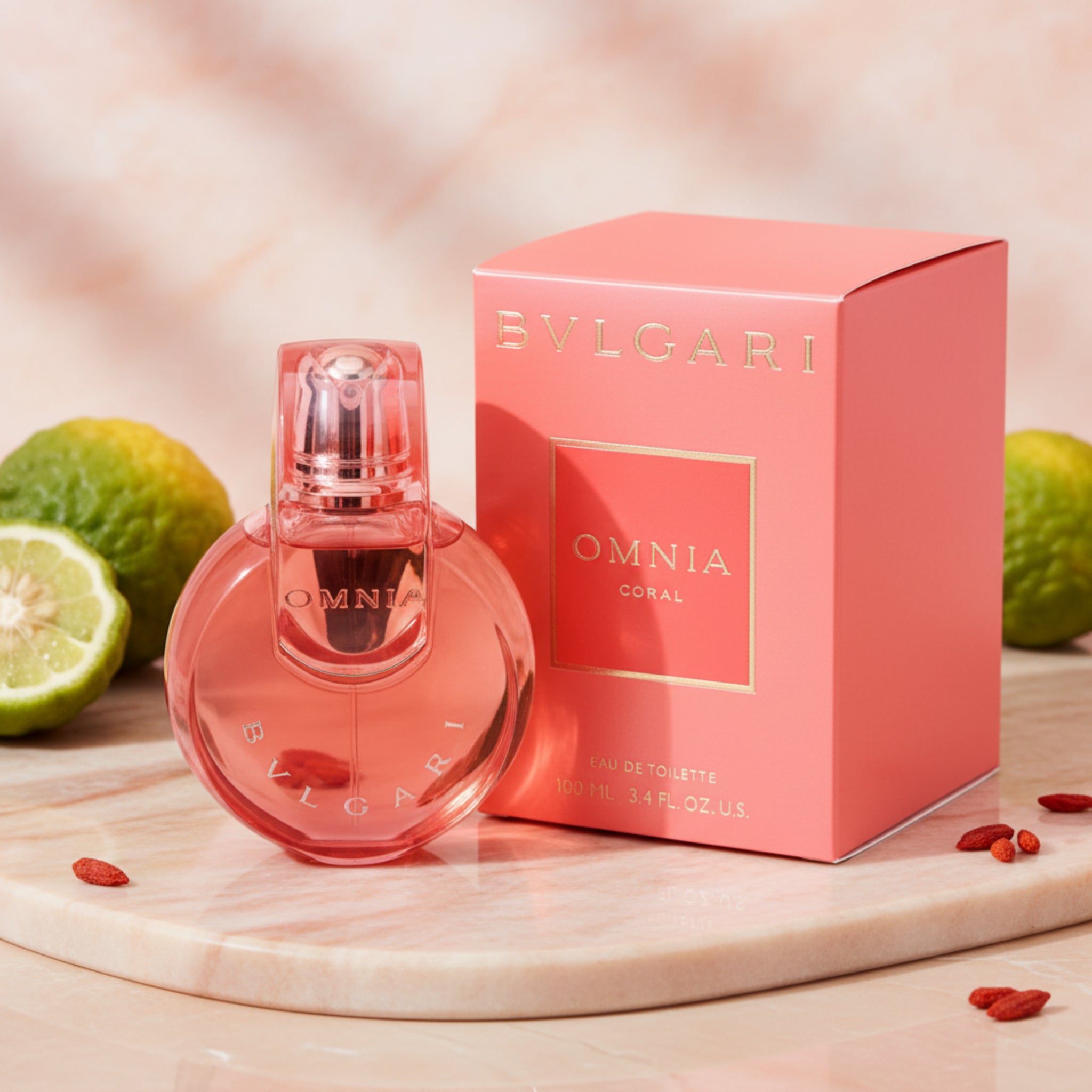 Bulgari Omnia Coral perfume bottle and packaging on a white background