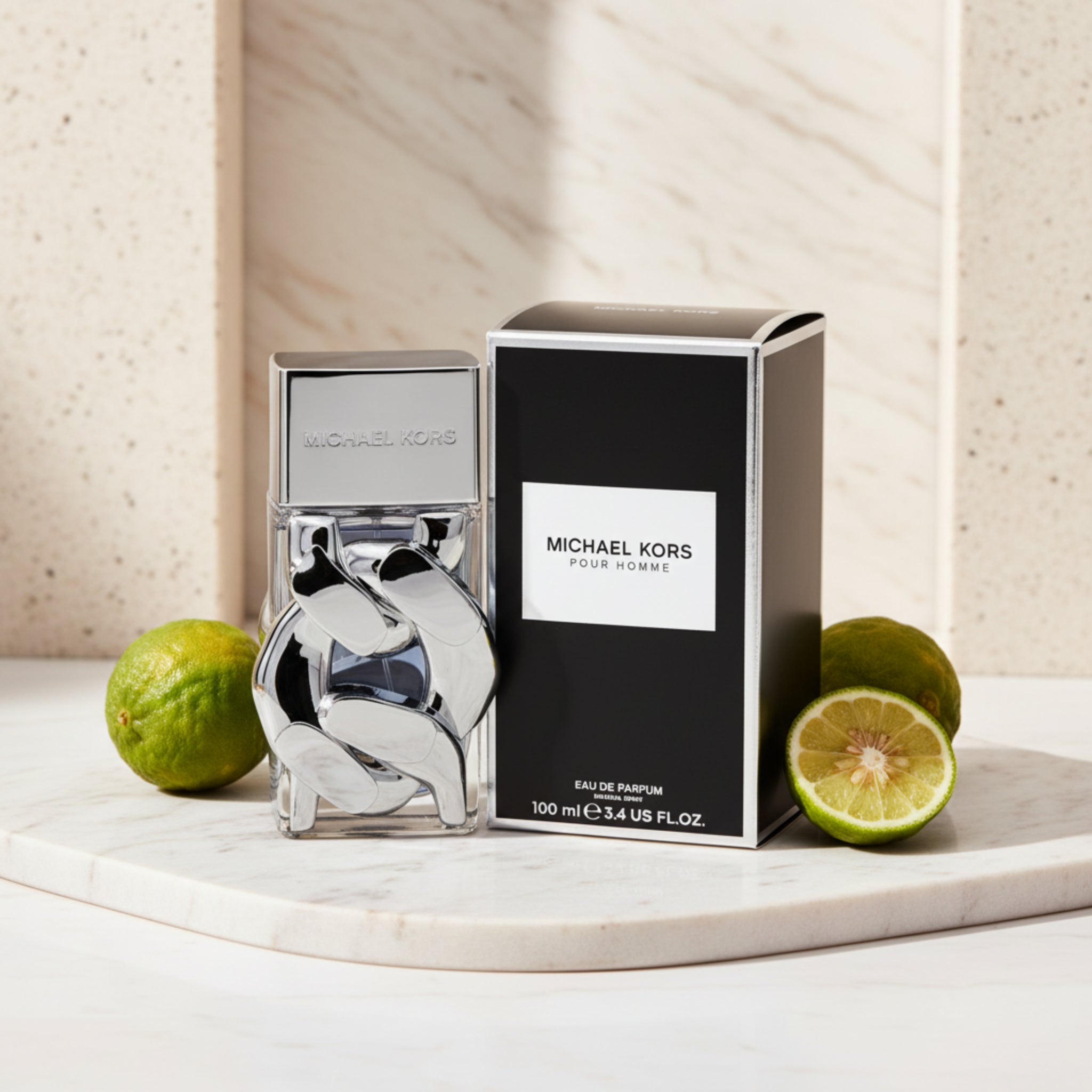 Michael Kors Pour Homme eau de parfum bottle and packaging on a white background