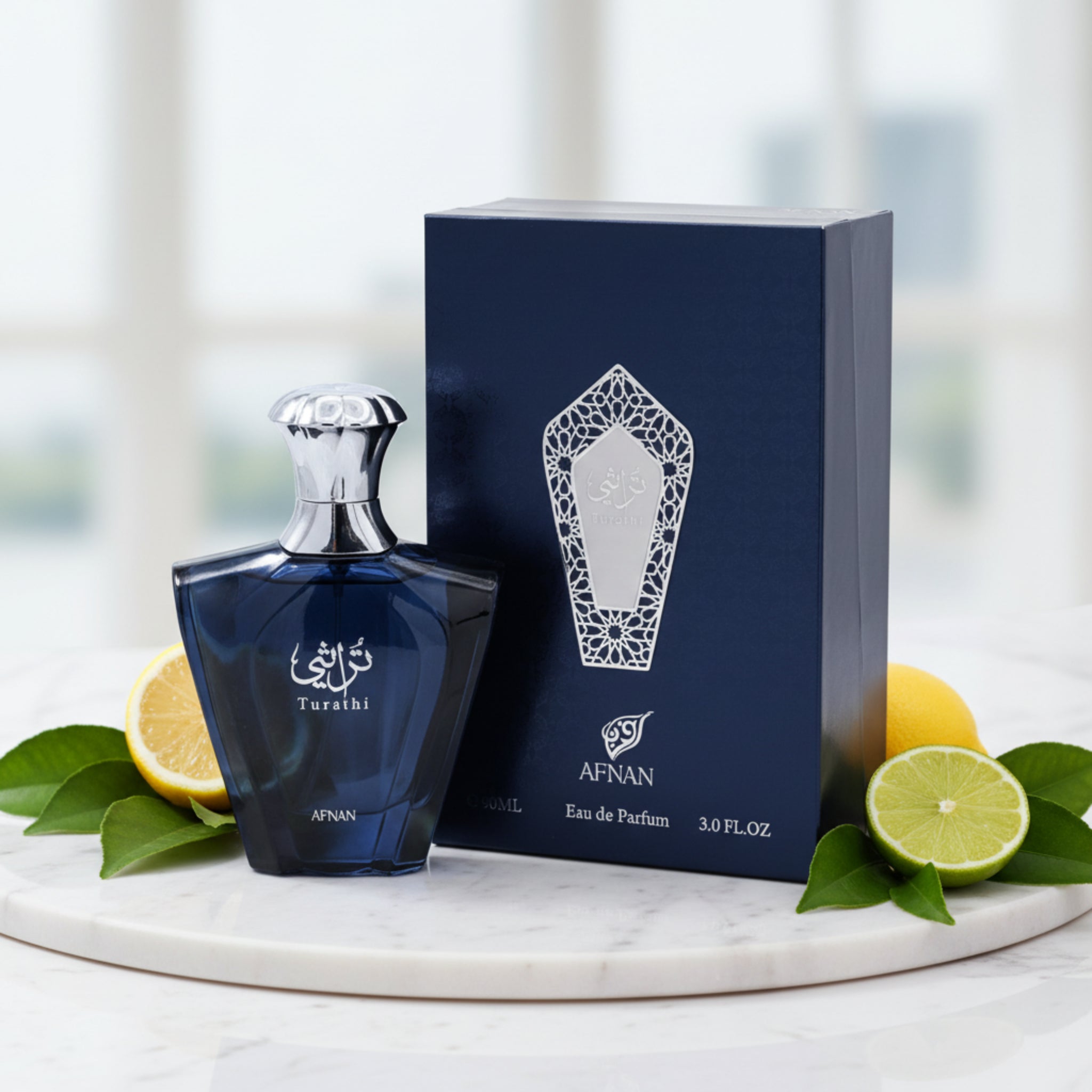 Blue Afnan perfume bottle and packaging on a white background