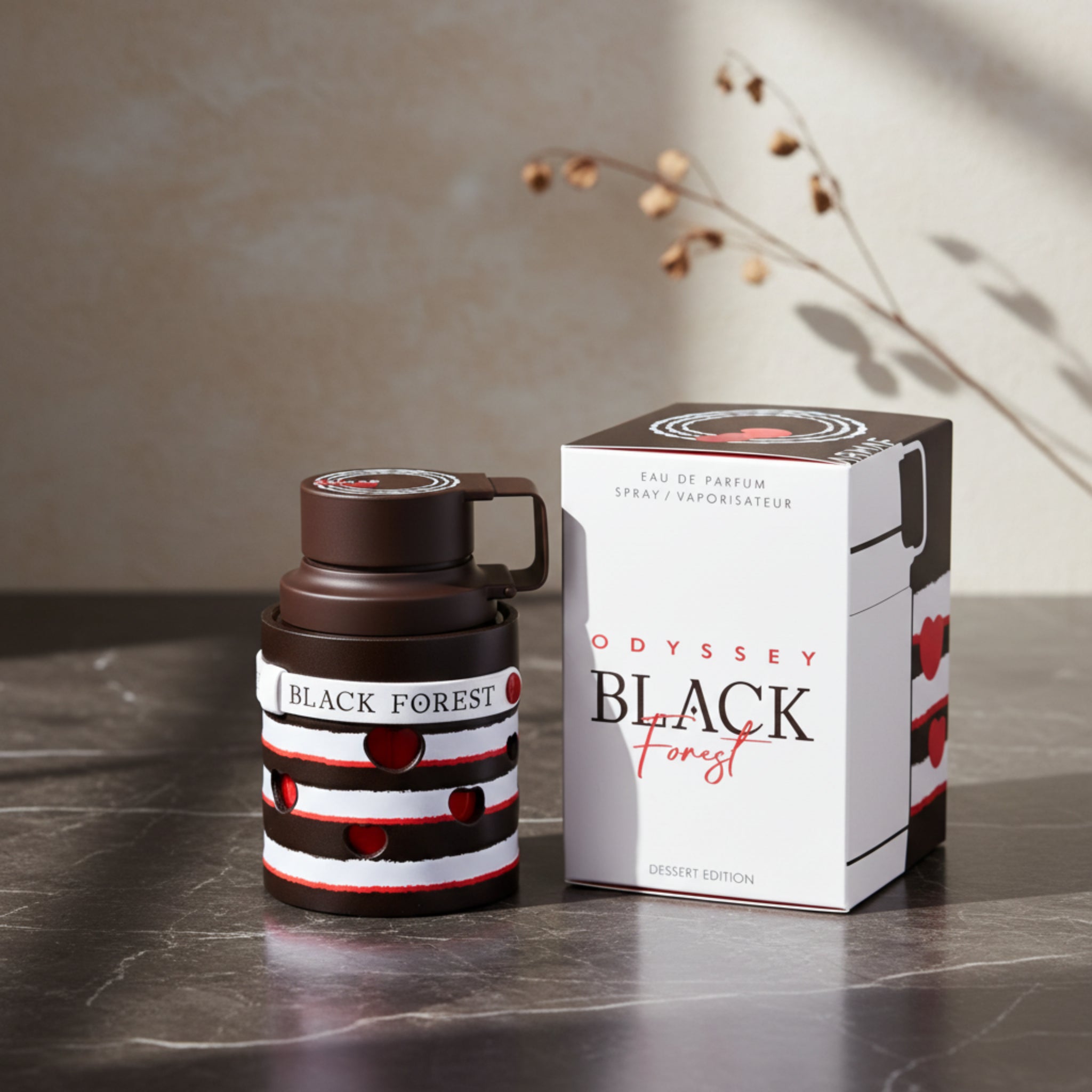 Odyssey Black Forest perfume bottle and packaging on a white background