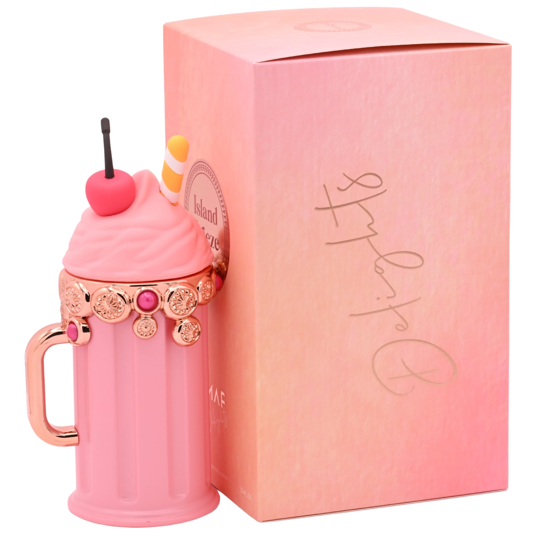 Pink dessert-shaped perfume bottle with 'Island Breeze' label packaging on a white background