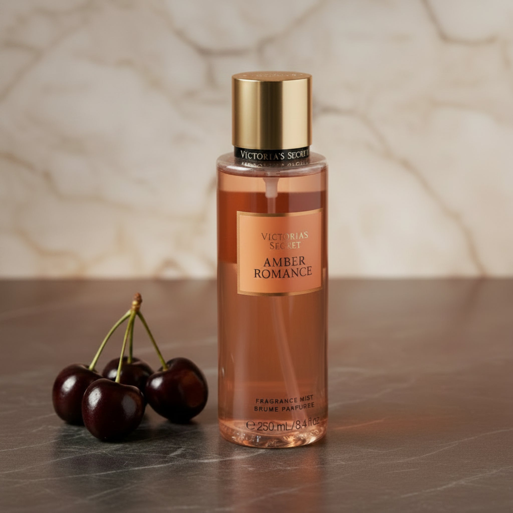 Victoria's Secret Amber Romance perfume bottle on a white background