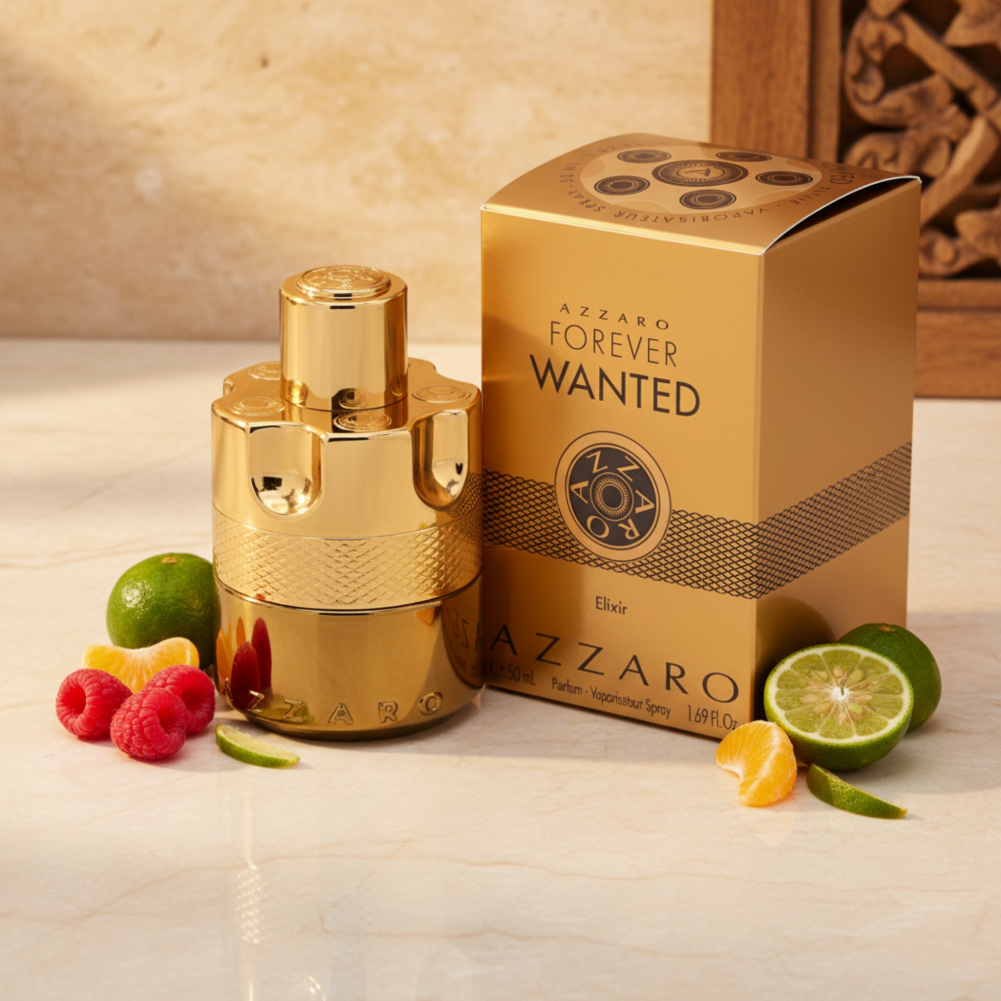 Gold Azzaro perfume bottle and packaging on a white background