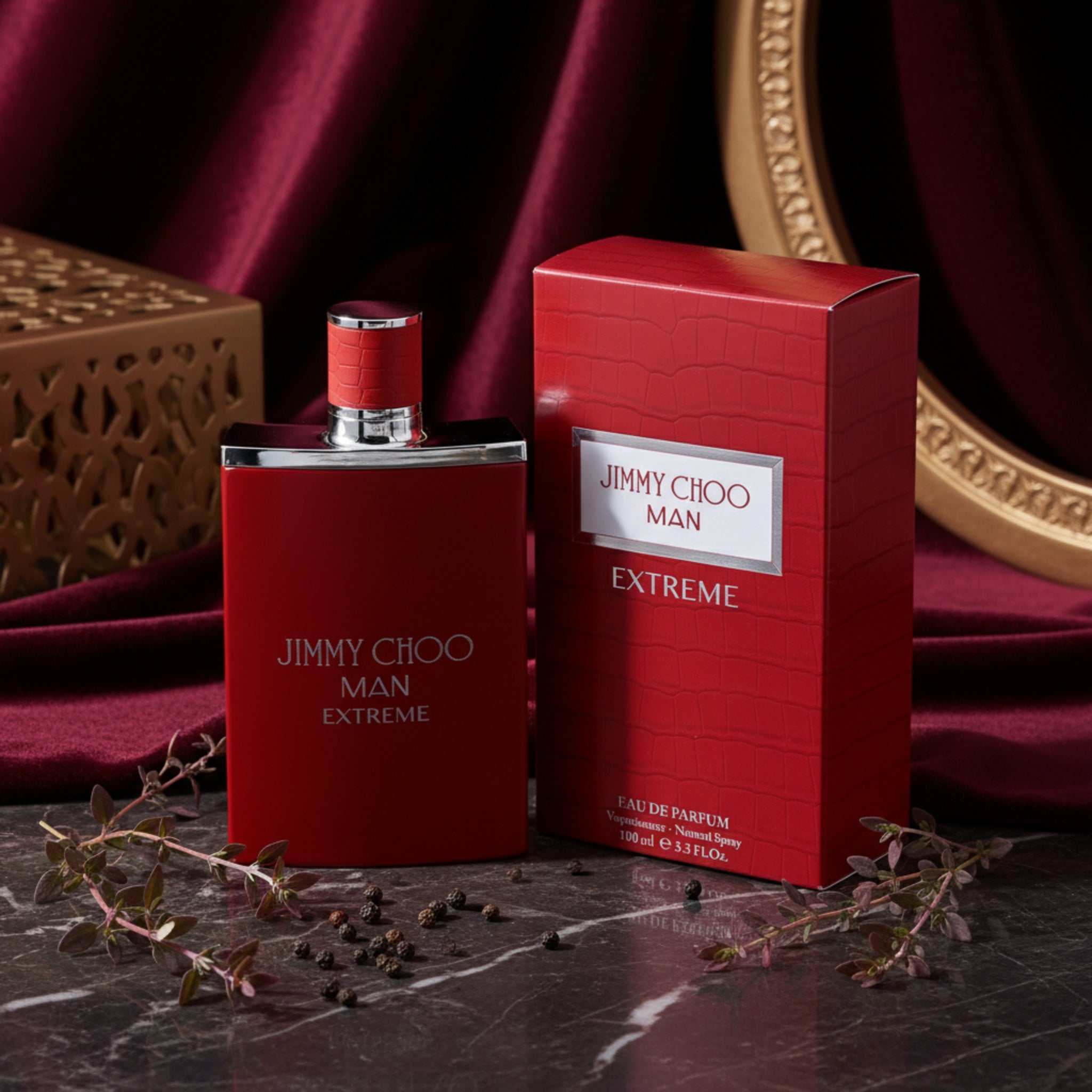 Red Jimmy Choo Man Extreme perfume bottle and packaging on a white background