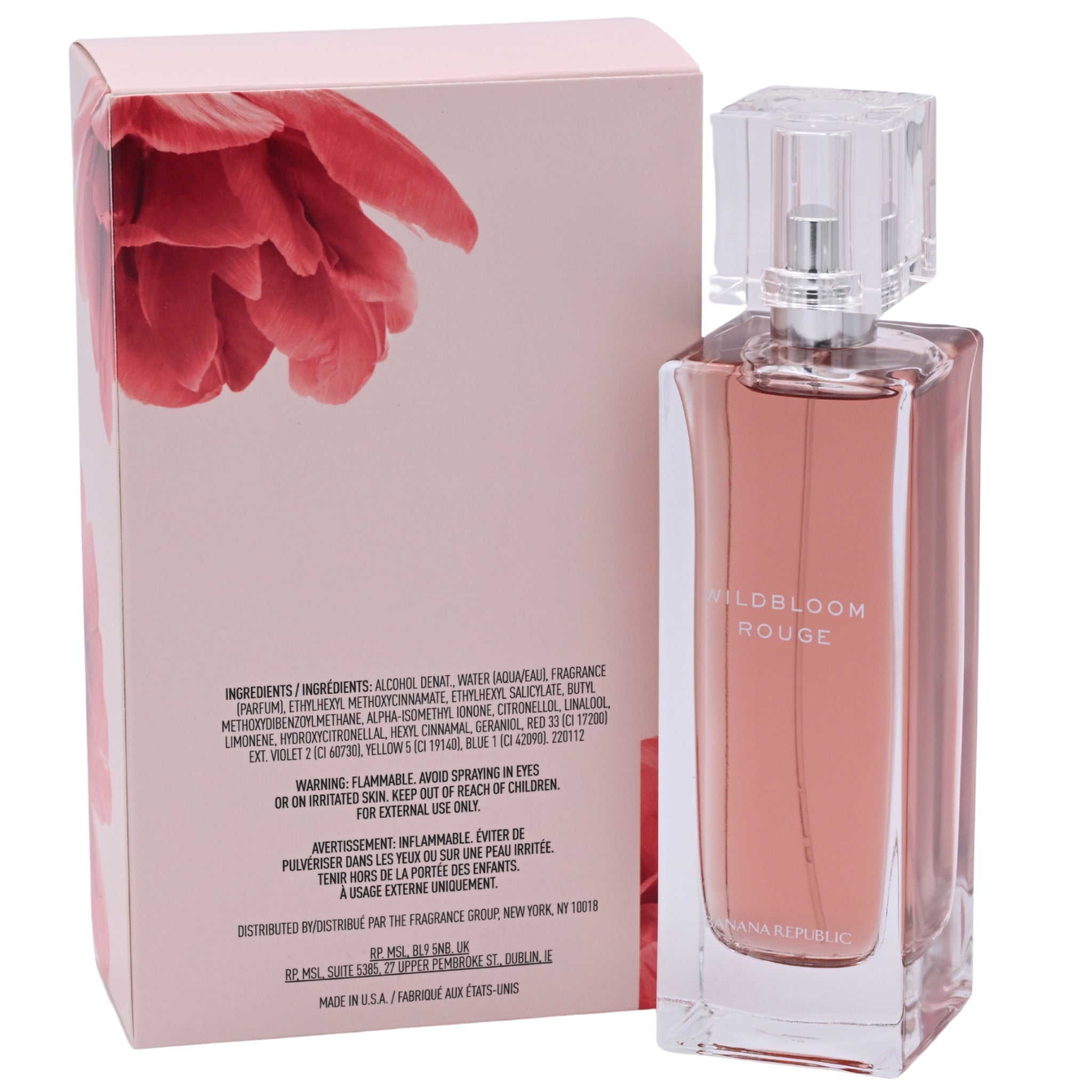Perfume bottle with pink floral design on packaging