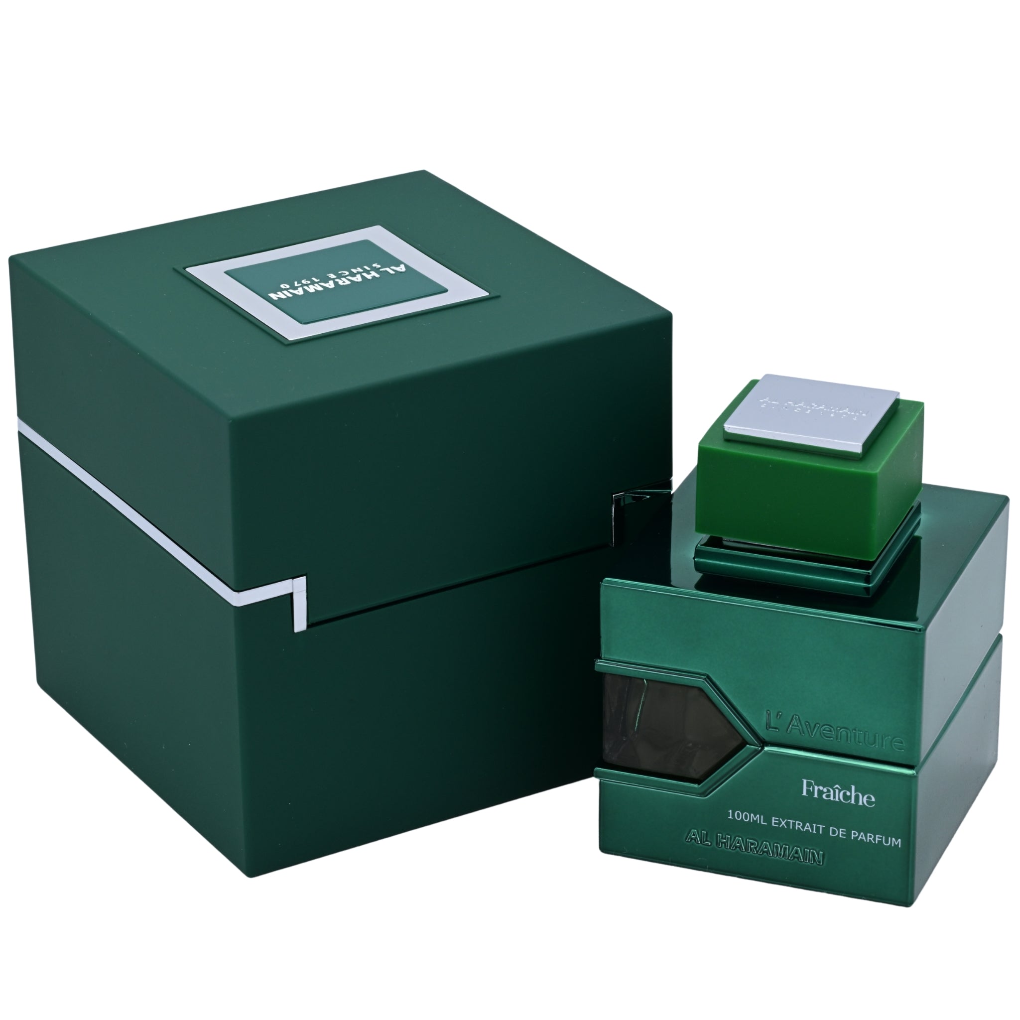Green perfume bottle and packaging on a white background