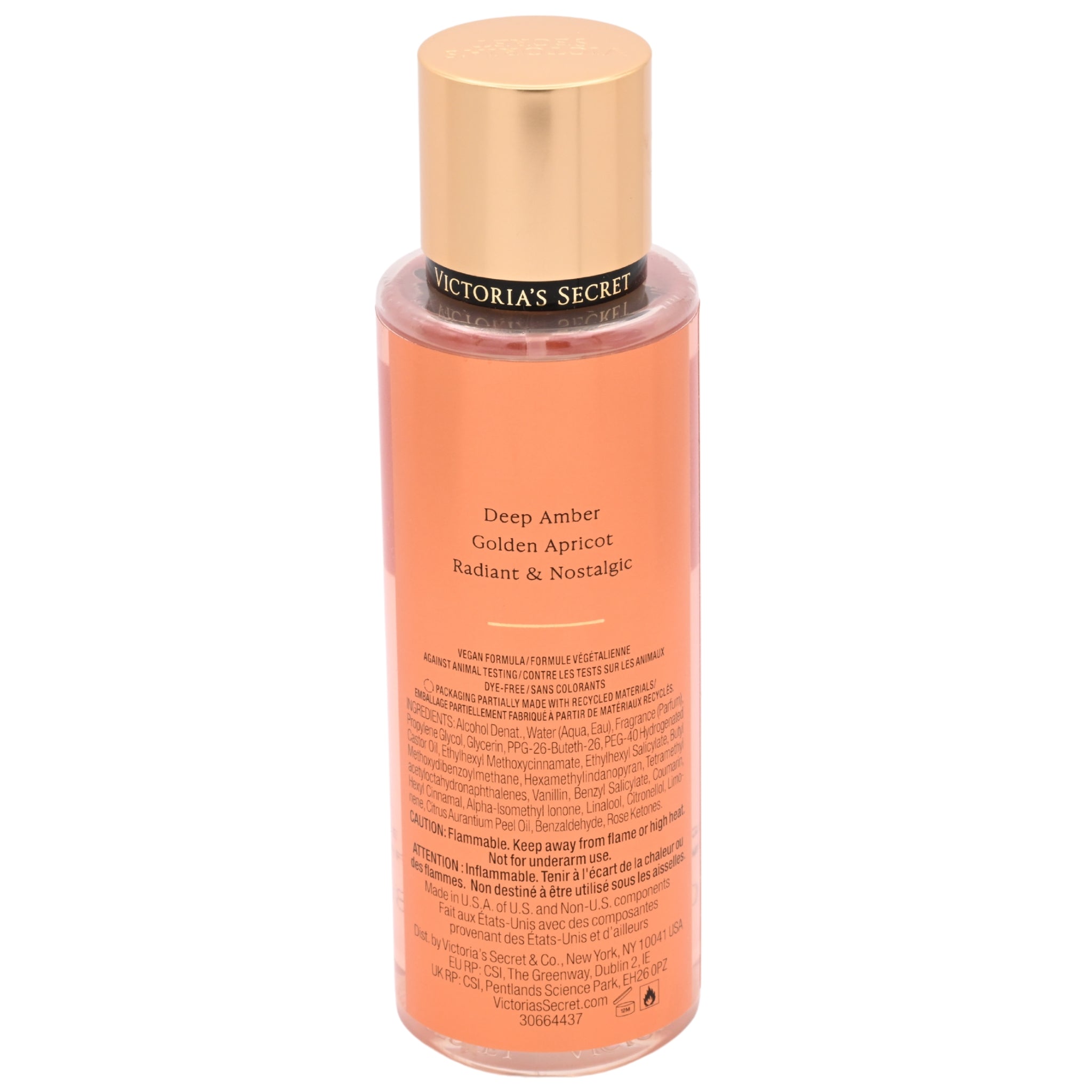 Victoria's Secret bottle of Deep Amber Golden Apricot fragrance on a white background