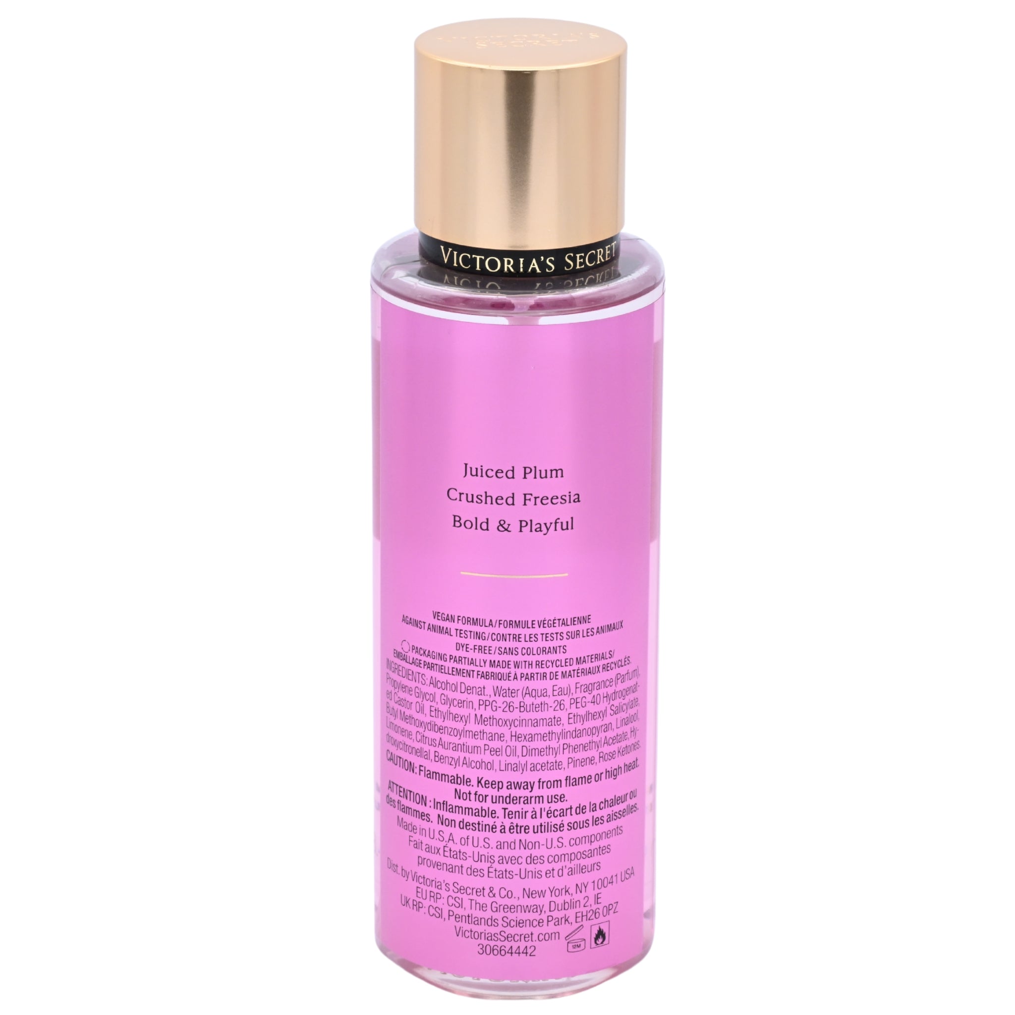 Pink bottle of Victoria's Secret body wash with gold cap on a white background