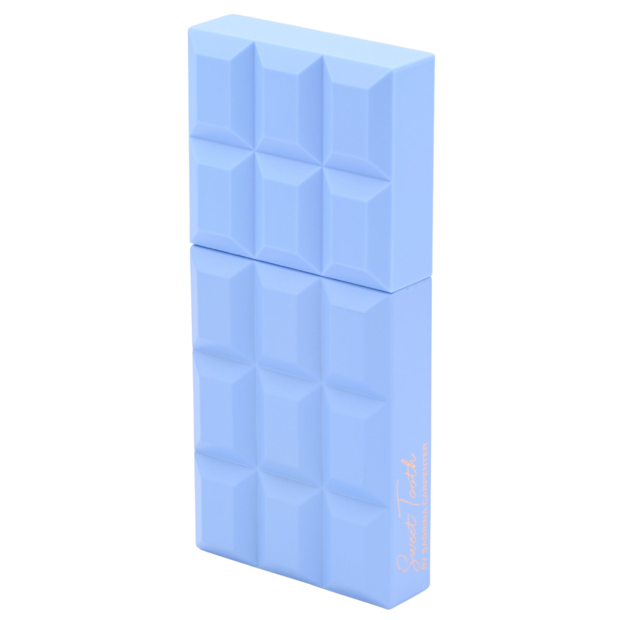 Blue chocolate bar-shaped perfume bottle on a white background.