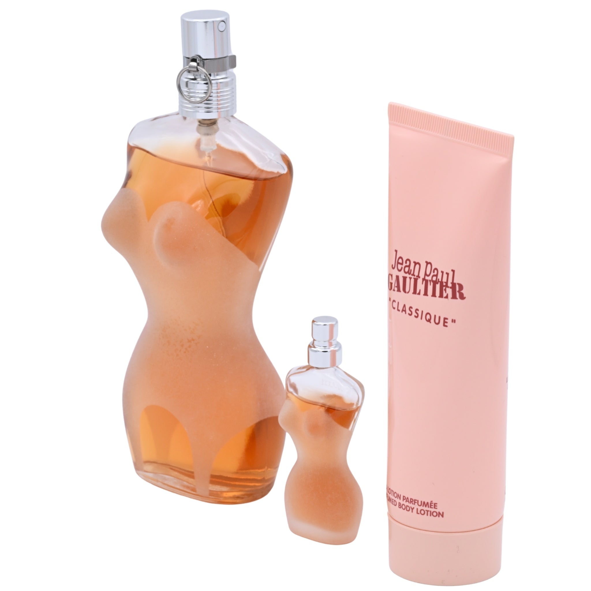 Jean Paul Gaultier perfume set with a large bottle, small bottle, and lotion on a white background