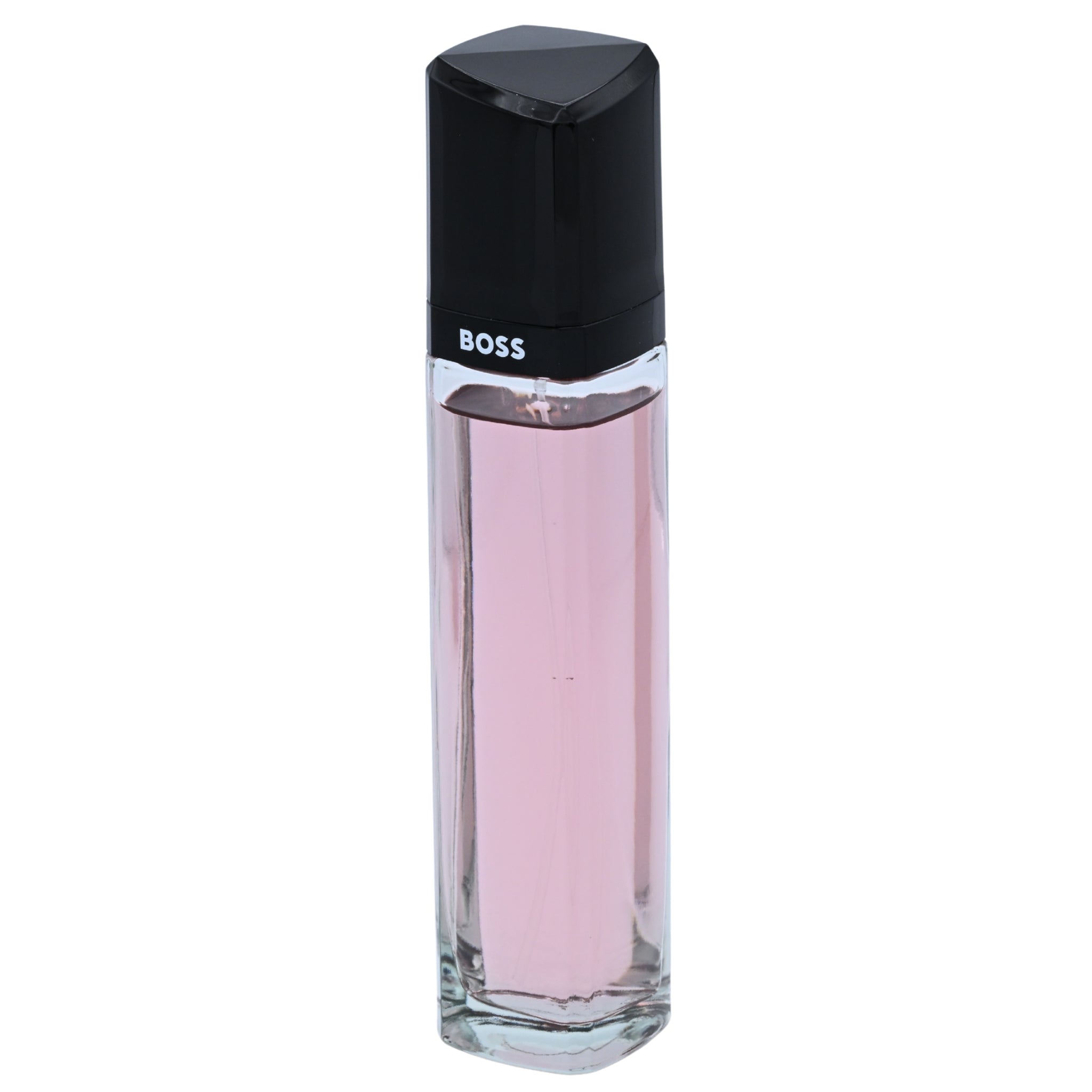 Perfume bottle with black cap and pink body on a white background