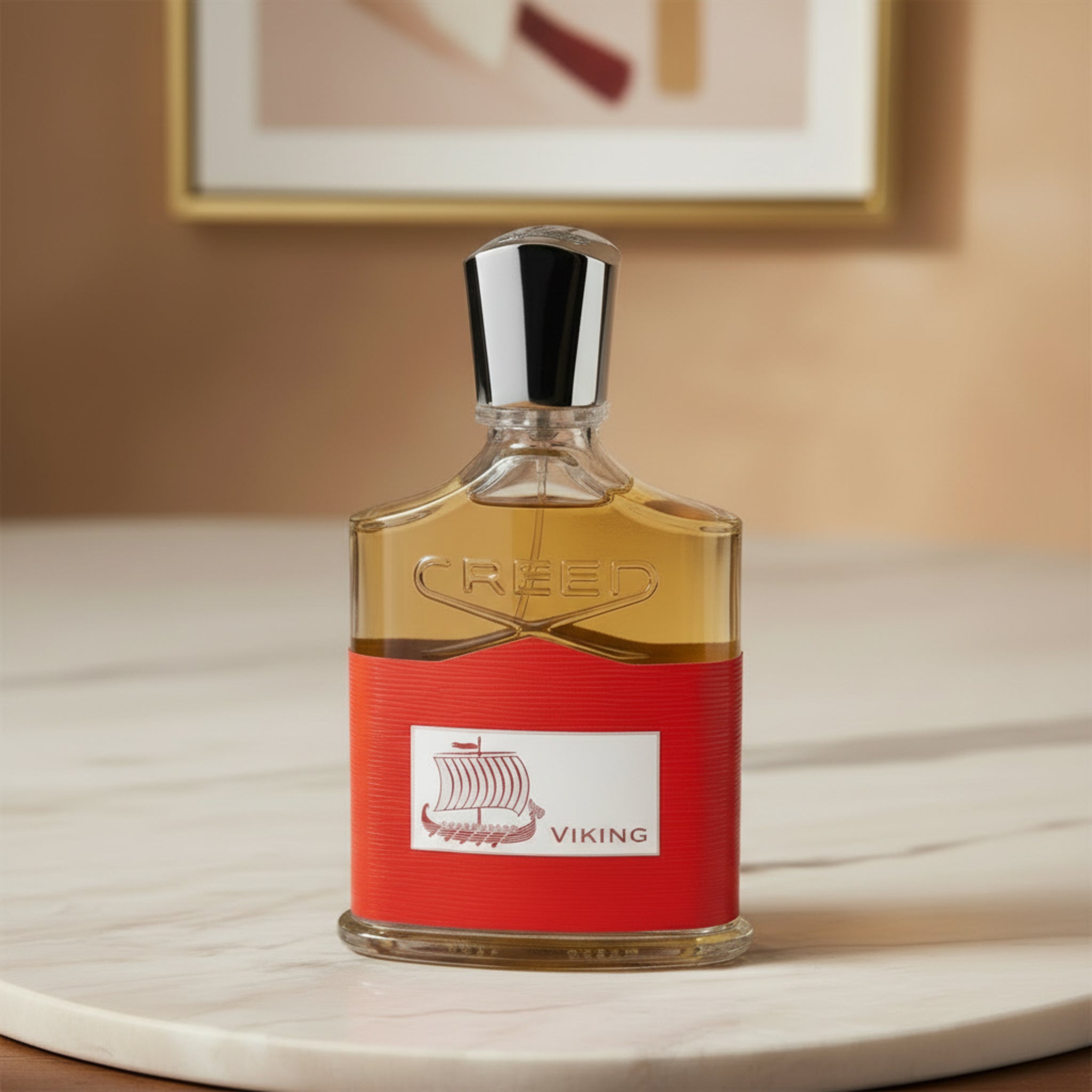 Perfume bottle with red label and Viking ship design on a white background