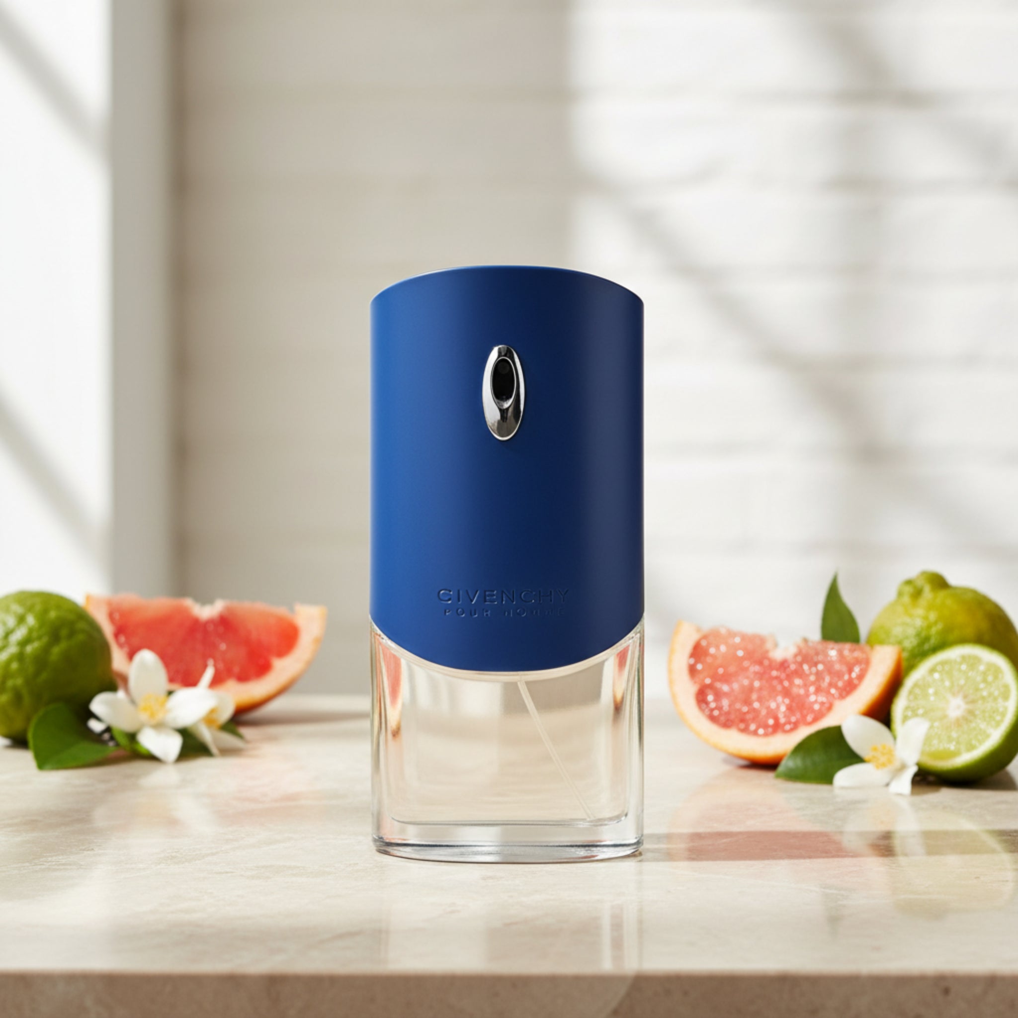 Blue Givenchy cologne bottle on a white background