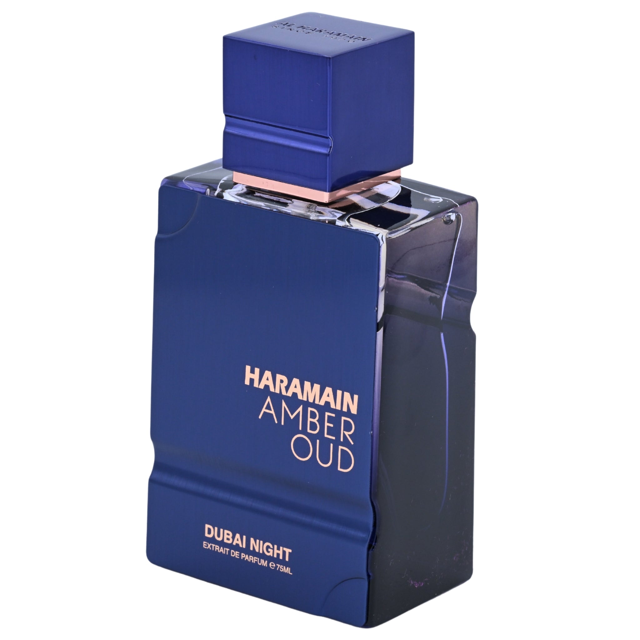 Blue perfume bottle with 'Haramain Amber Oud' branding on a white background