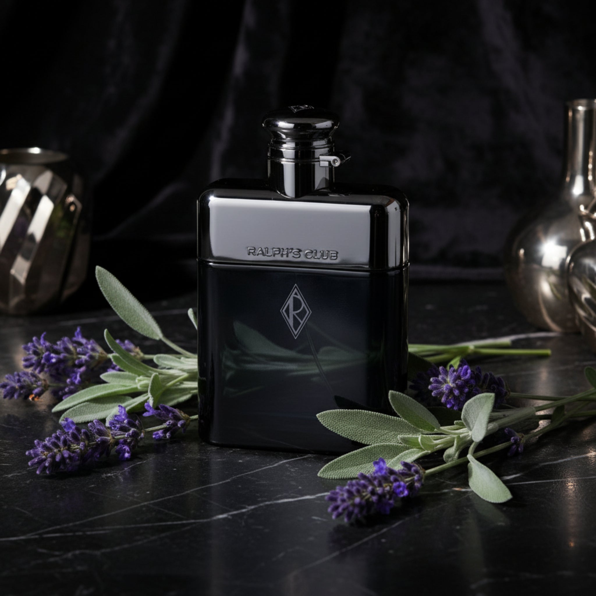 Silver and black flask with 'Ralphs Club' branding on a white background