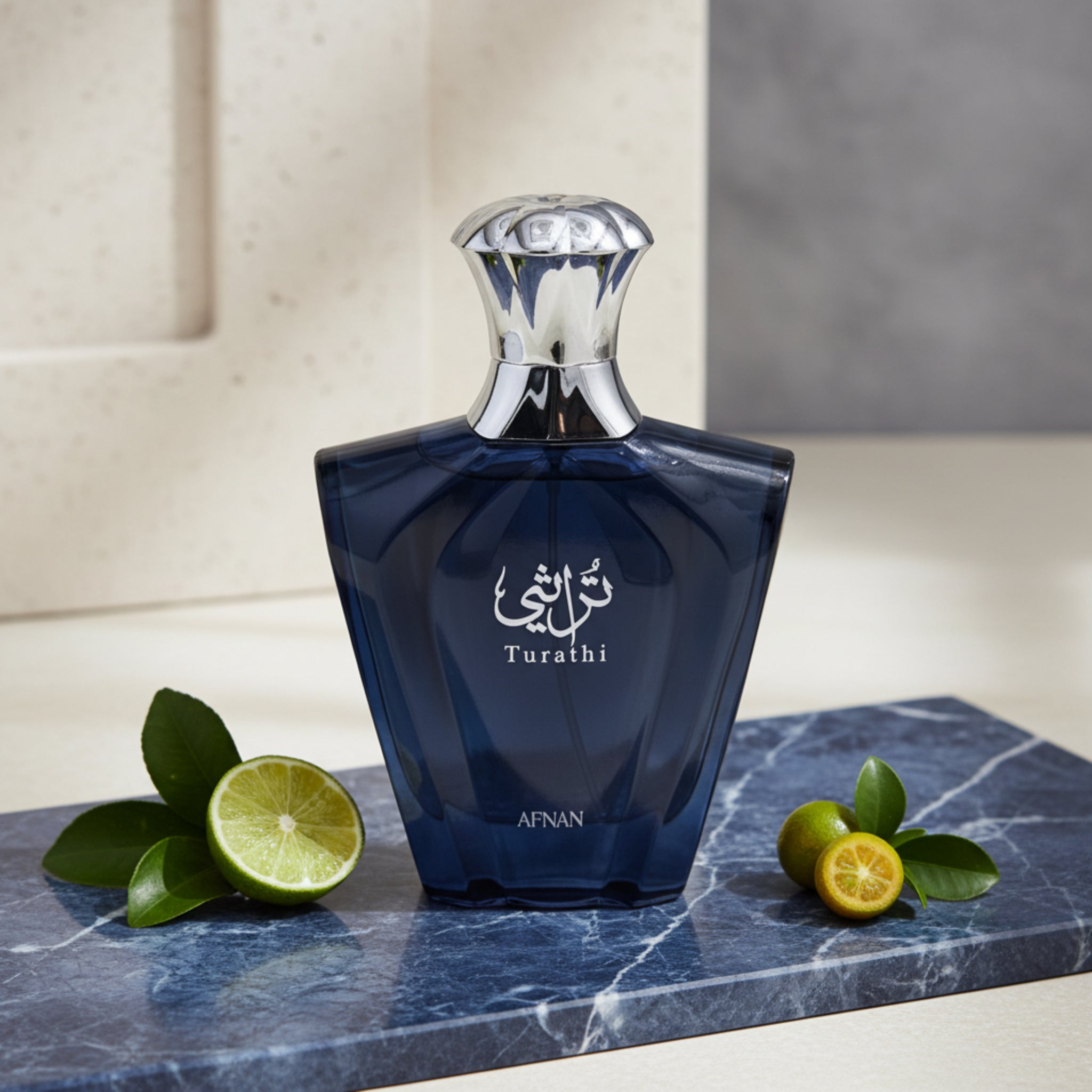 Blue perfume bottle with silver cap on a white background