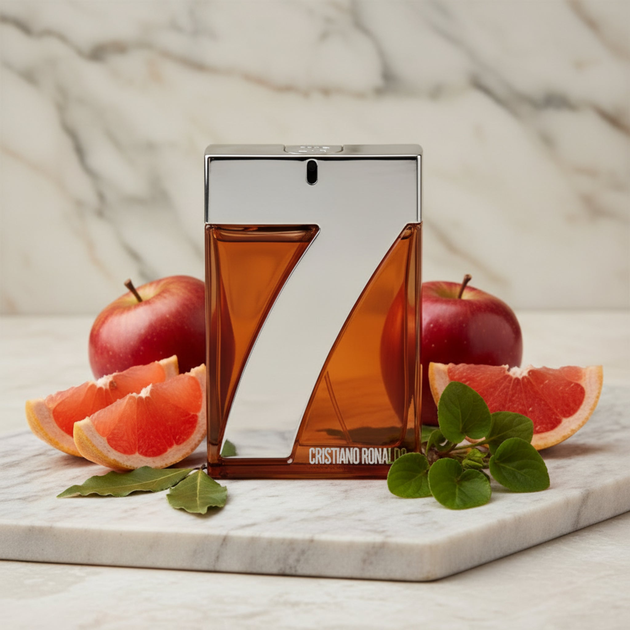 Cristiano Ronaldo perfume bottle with orange and silver design on a white background