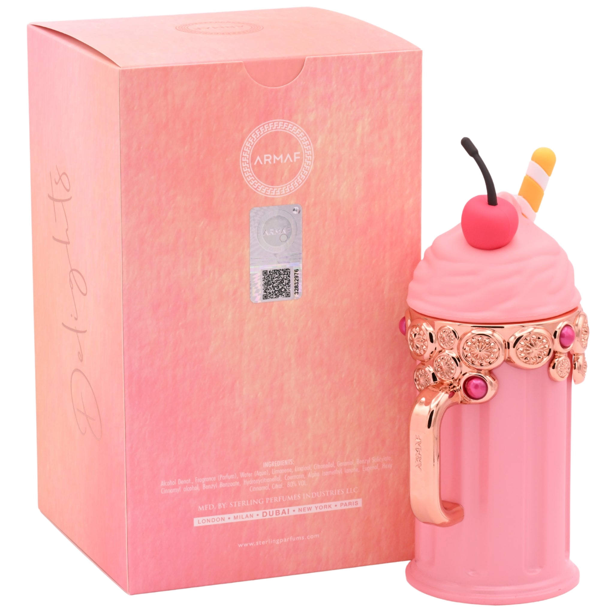 Pink perfume bottle with decorative elements and matching box on a white background