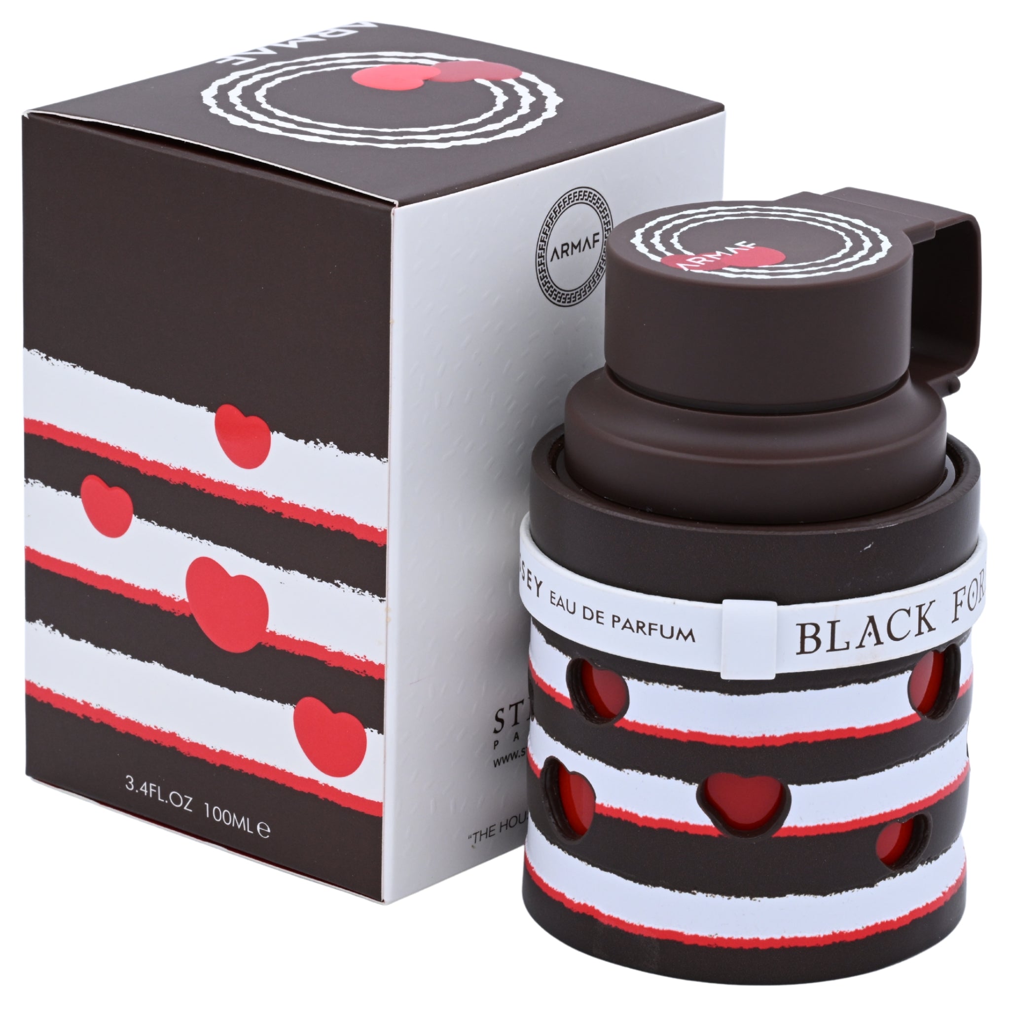 Perfume bottle with black and red design next to its packaging on a white background