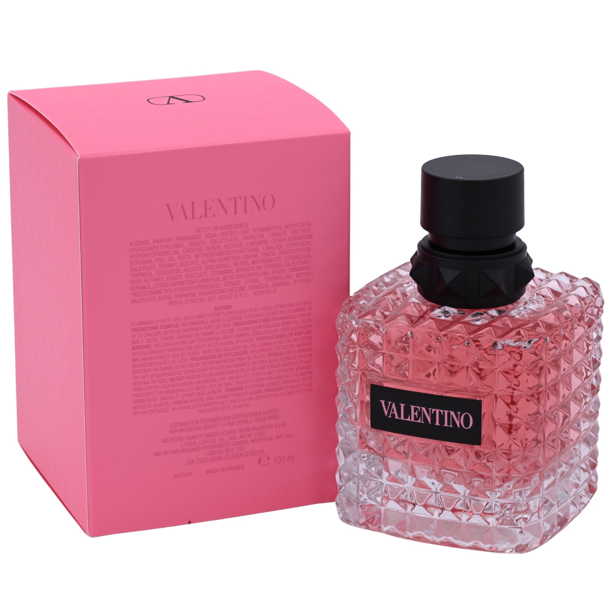Valentino pink perfume bottle and packaging on a white background
