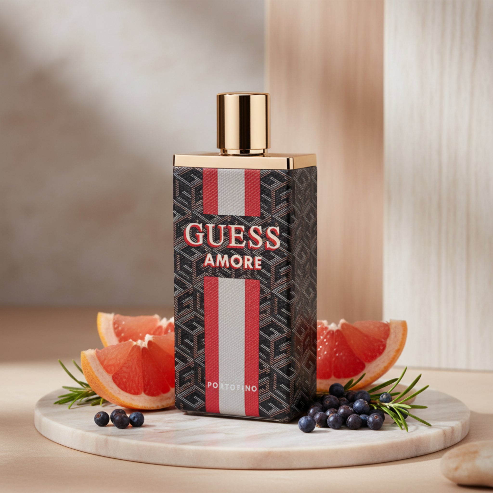 Guess Amore perfume bottle with gold cap on a white background