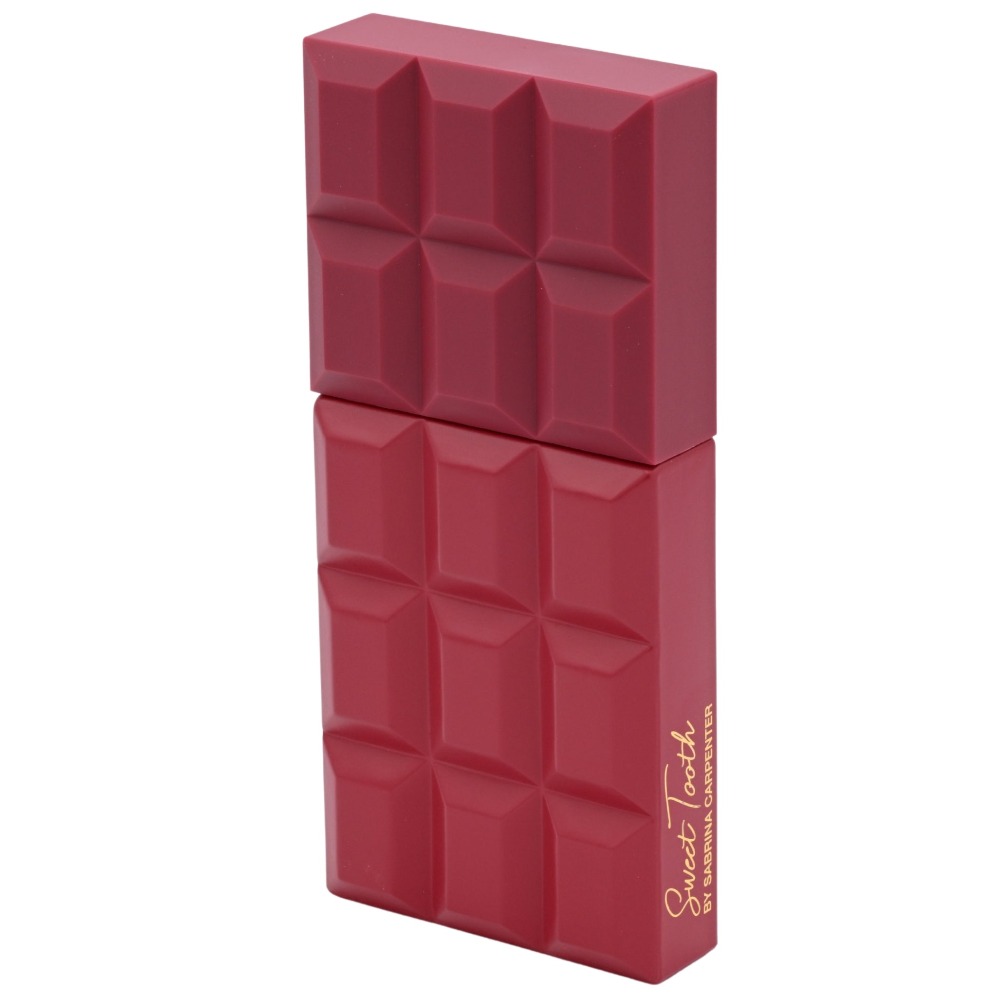 Red perfume bottle with geometric design on a white background