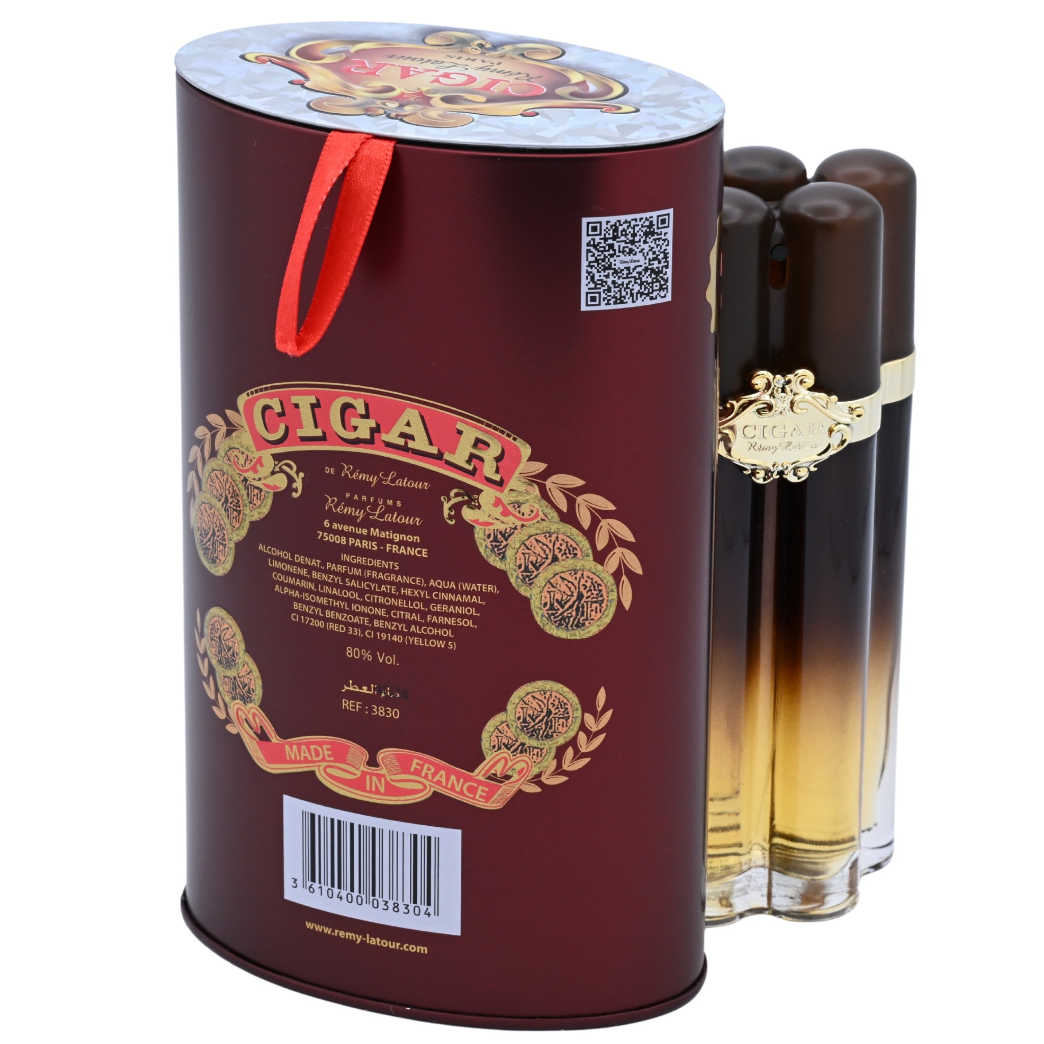 Cigar-shaped perfume bottles with decorative packaging on a white background