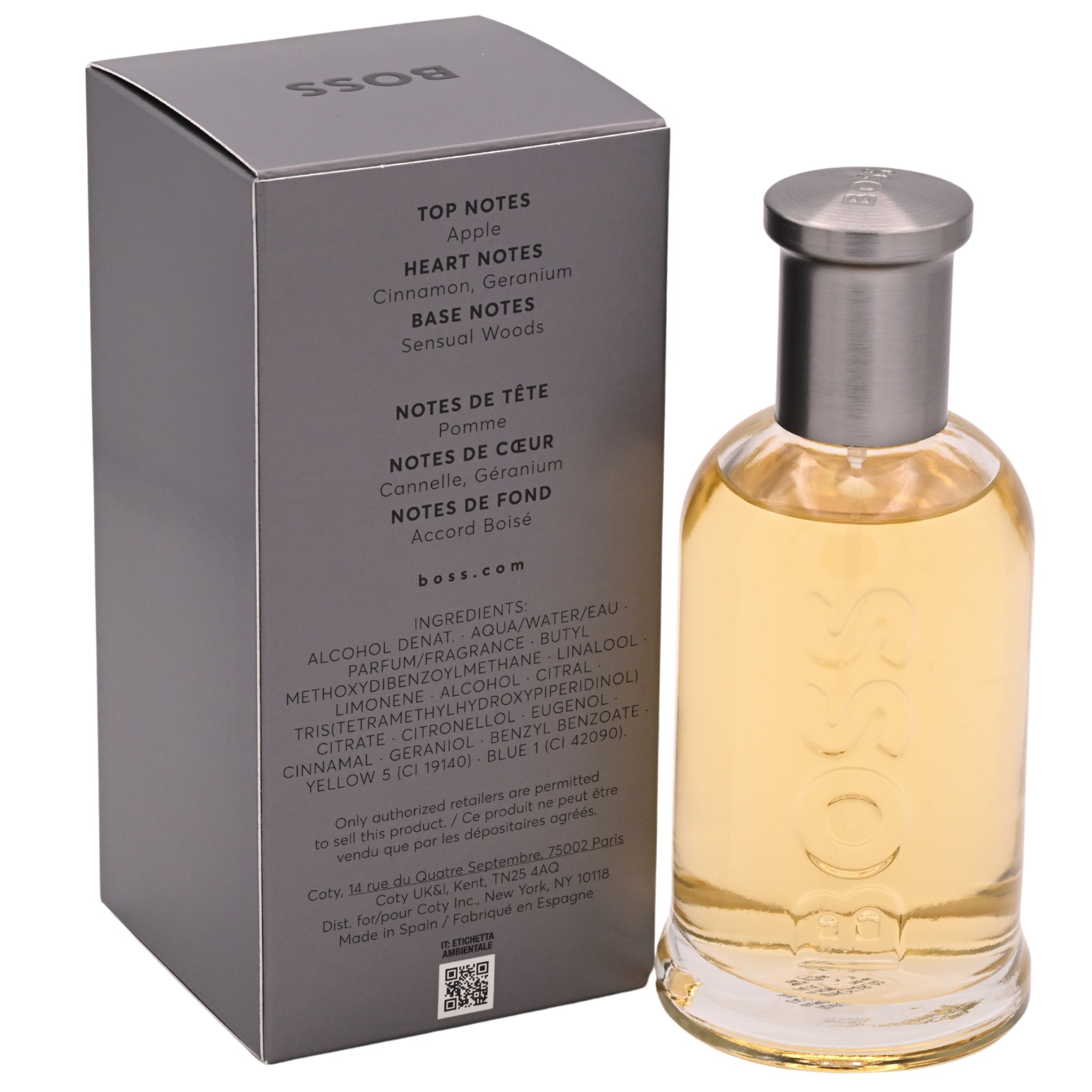 Perfume bottle with packaging displaying brand name and ingredient details.