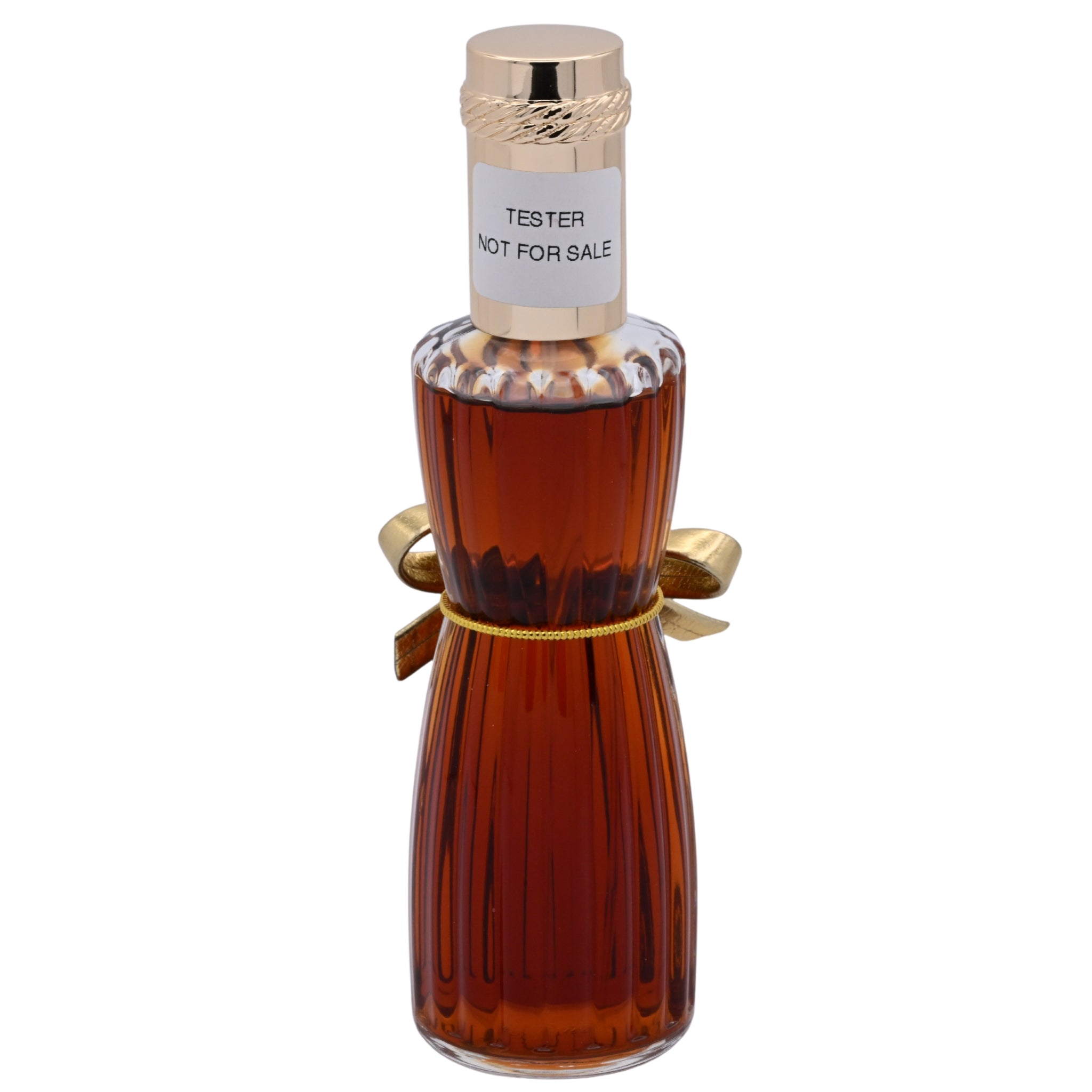 Amber glass perfume bottle with gold cap and decorative elements on a white background