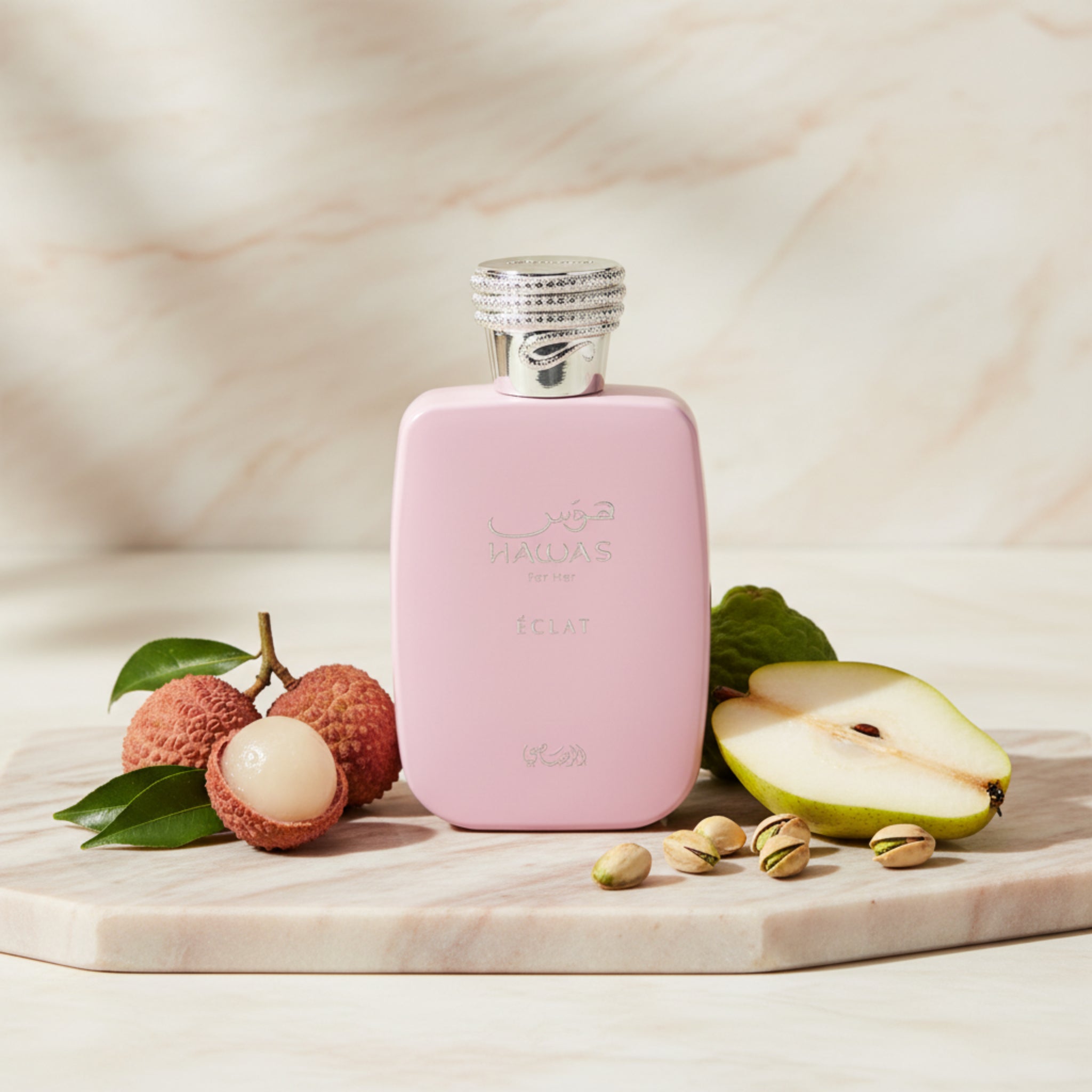 Pink Hawas Eclat perfume bottle with silver cap on a white background
