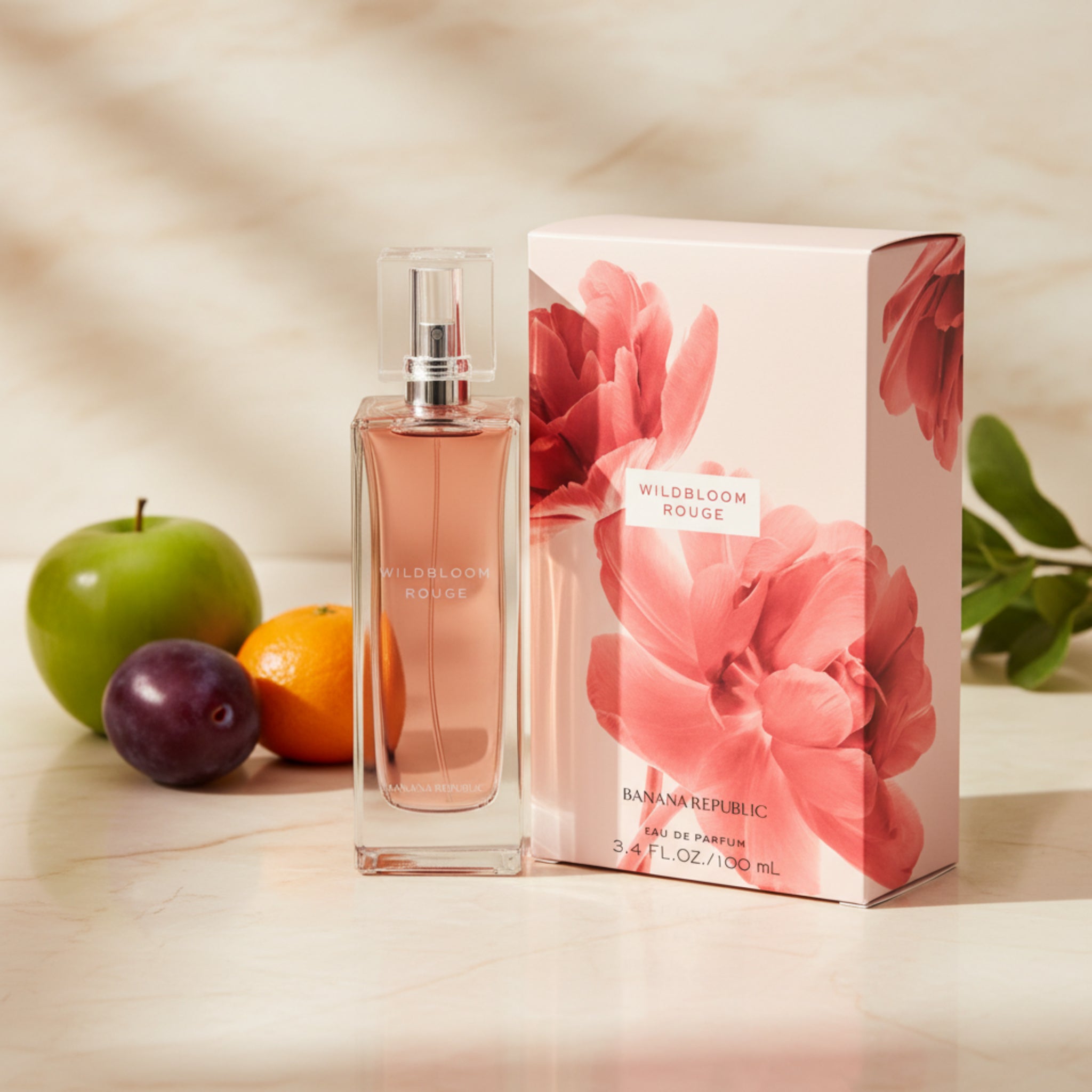 Banana Republic Wildbloom Rouge perfume bottle and packaging with red floral design.