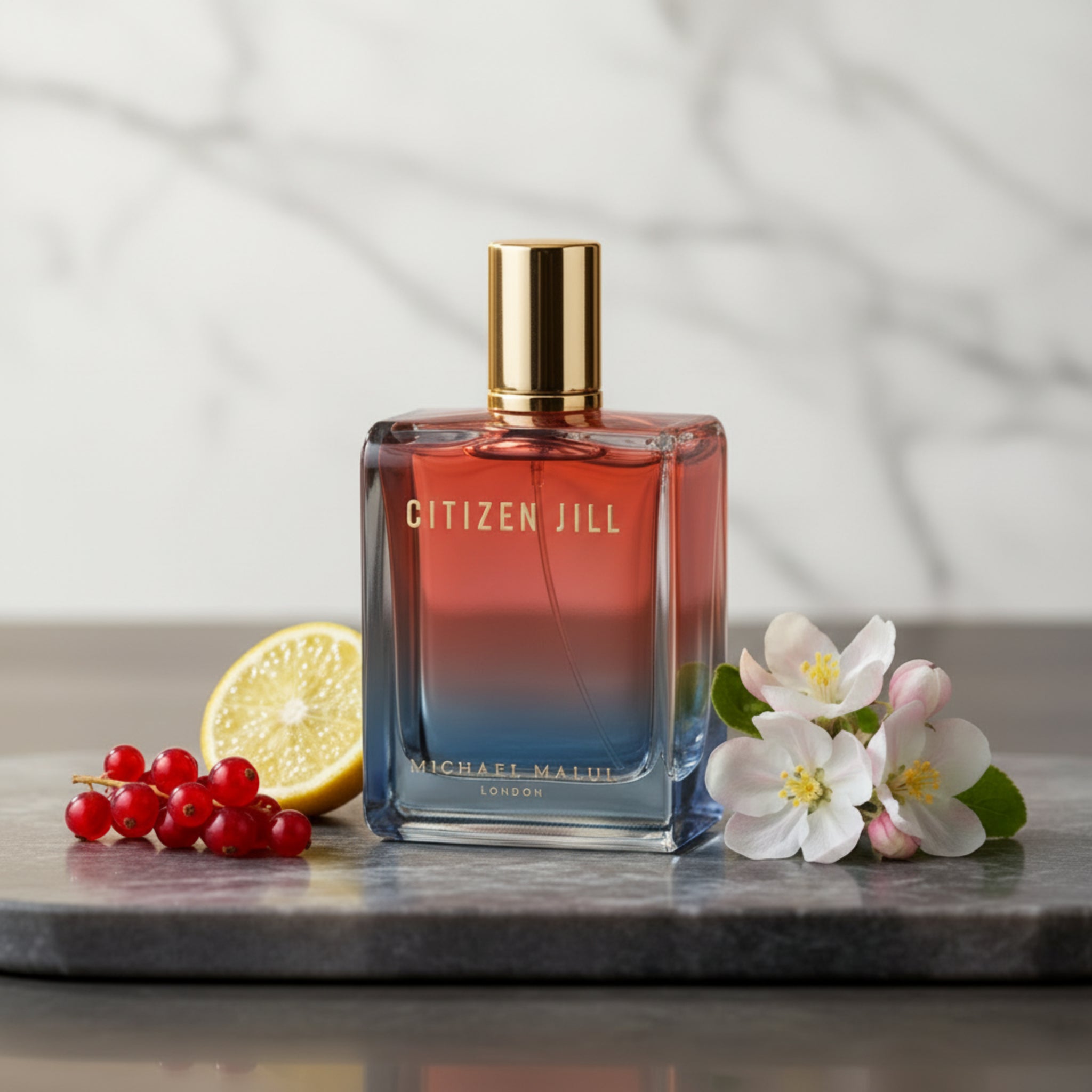 Perfume bottle with gradient design and gold cap on a white background
