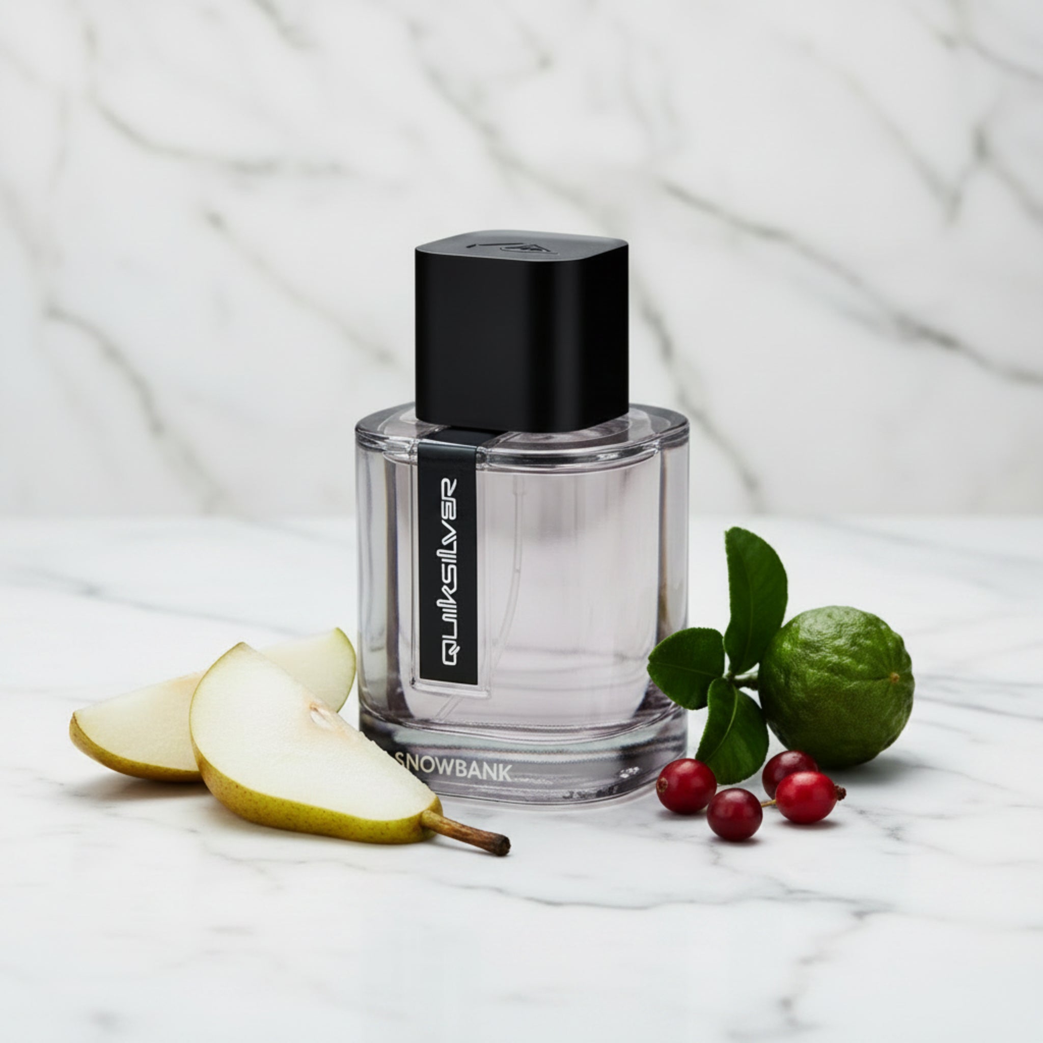 Clear perfume bottle with black cap and 'Quiksilver Snowbank' label on a white background