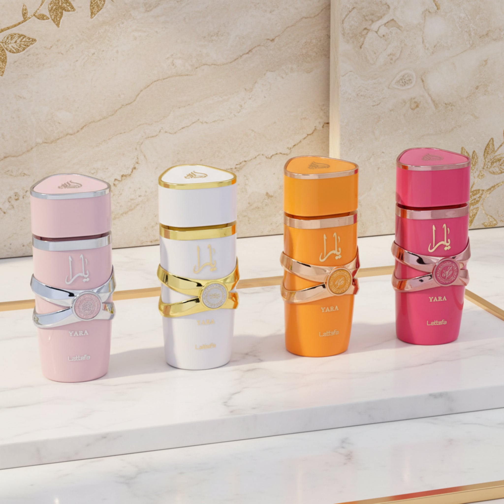 Four colorful perfume bottles with gold accents and 'Yara' branding on a white background