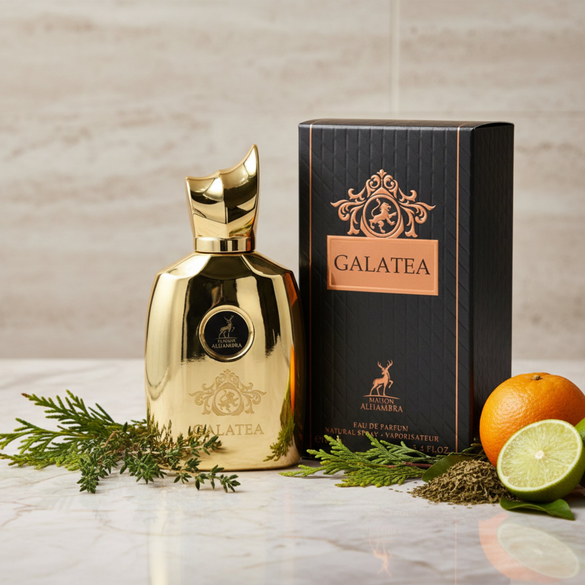 Gold perfume bottle and black packaging with 'Galatea' branding on a white background