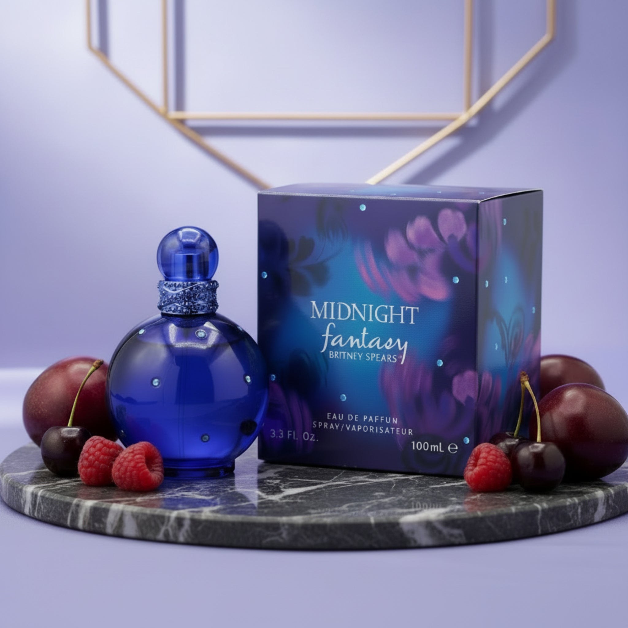 Blue perfume bottle and packaging with 'Midnight Fantasy' text on a white background