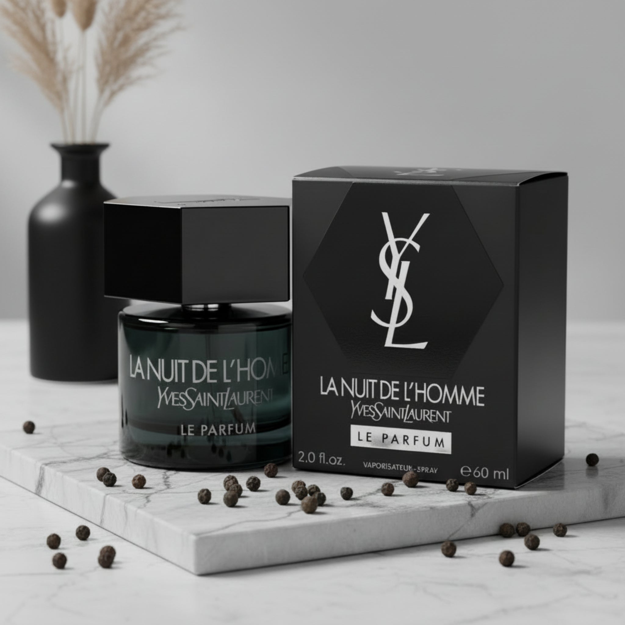 YSL La Nuit de L'Homme perfume bottle and packaging on a white background