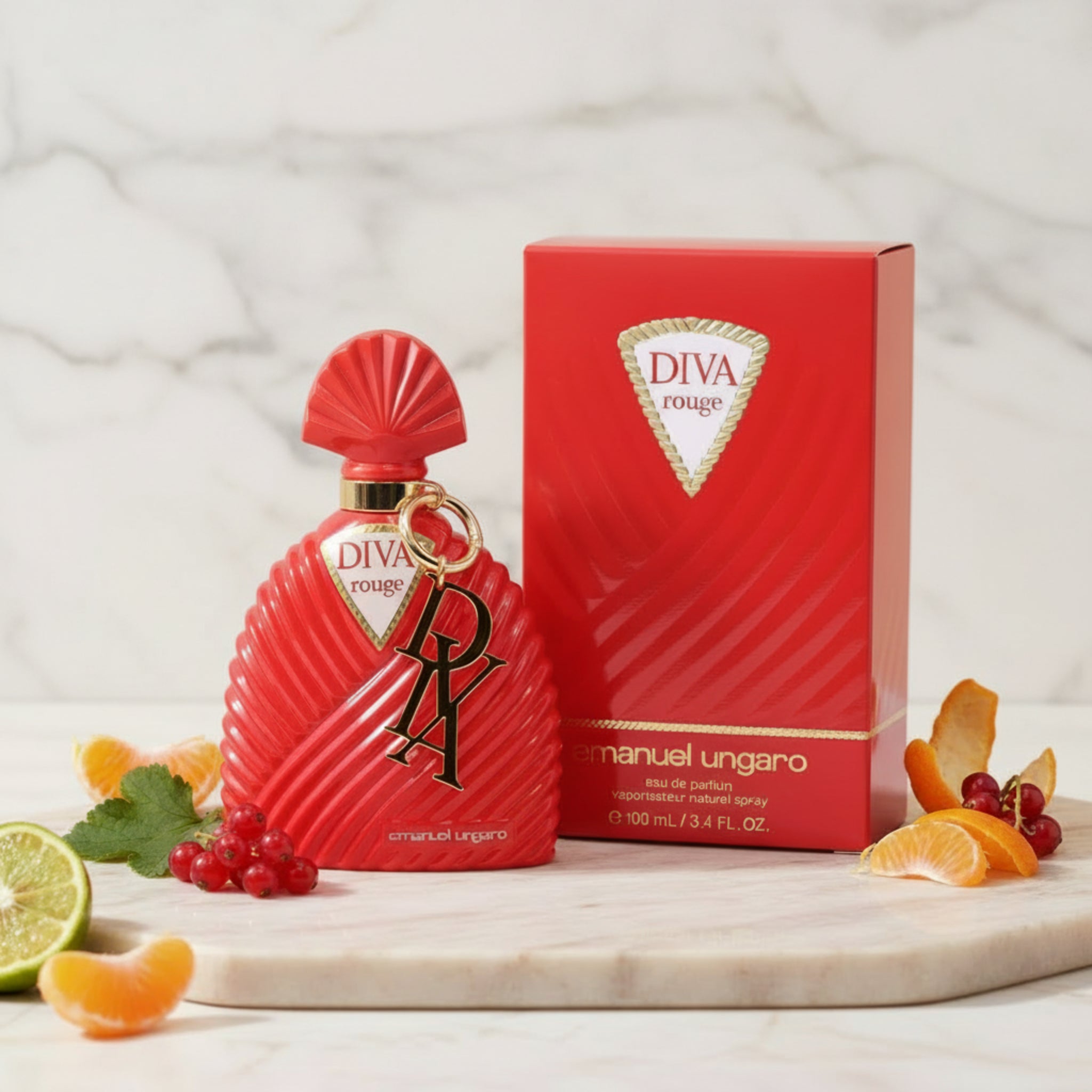Red Emanuel Ungaro Diva Rouge perfume bottle and packaging on a white background