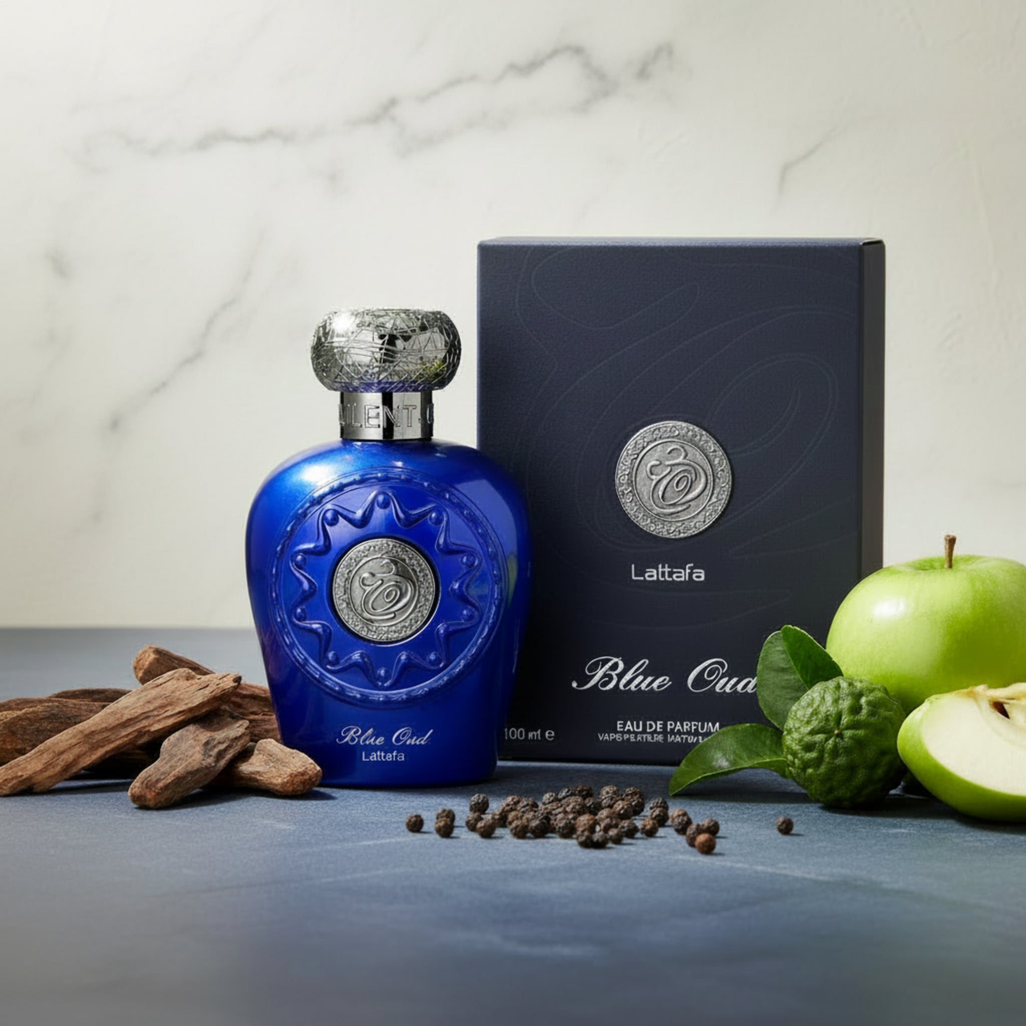 Blue Lattafe perfume bottle and packaging on a white background