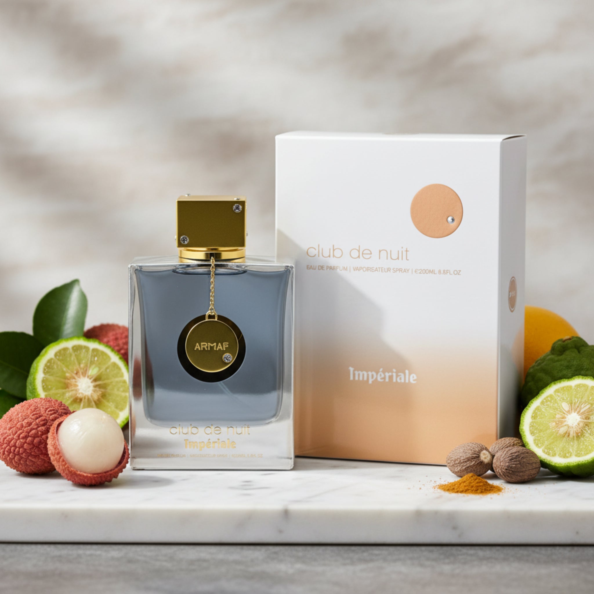 Perfume bottle and packaging of Armaf Club de Nuit Imperiale on a white background