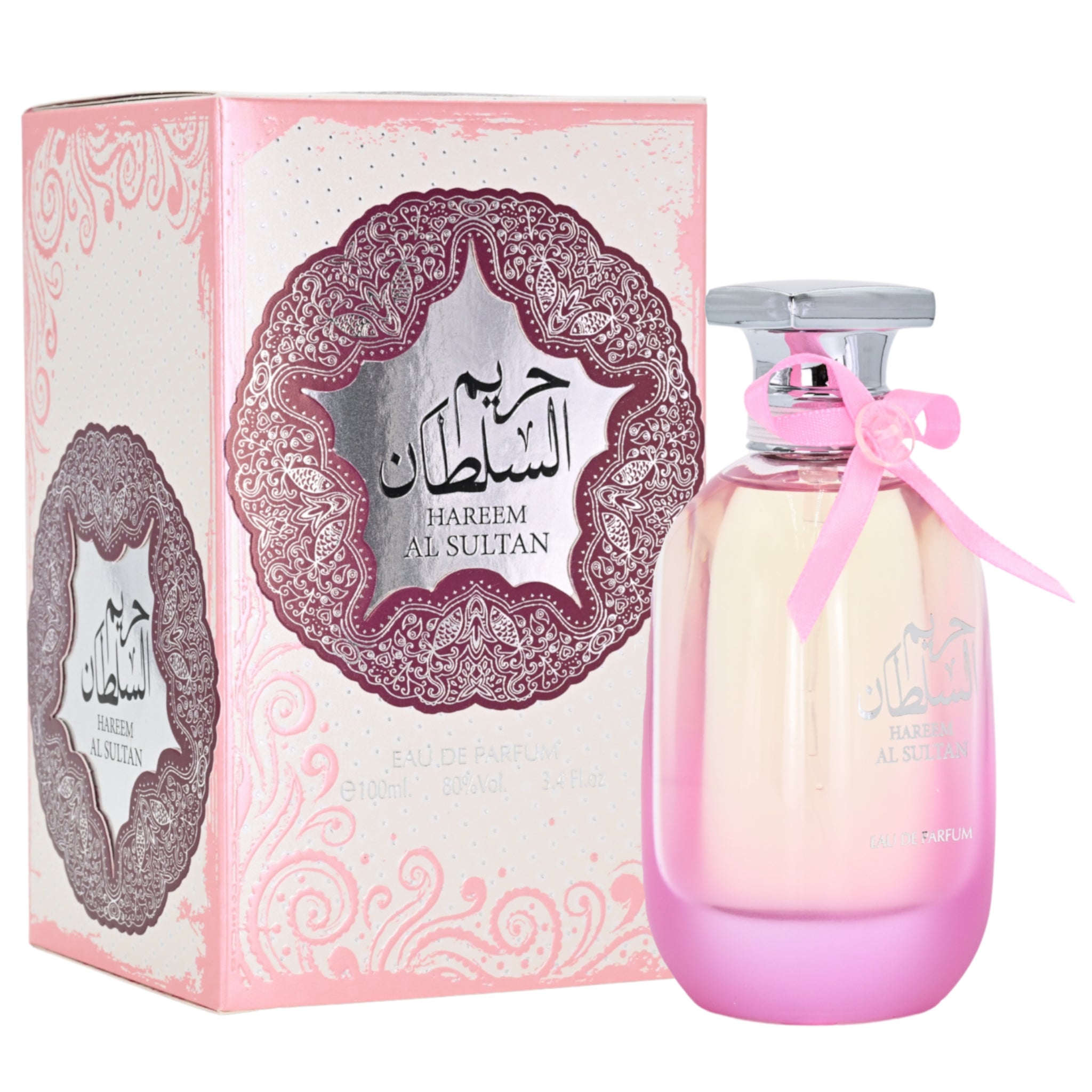 Perfume bottle and packaging with decorative design on a white background