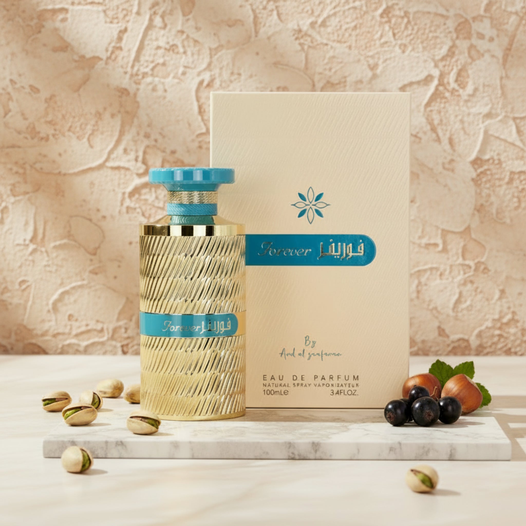 Perfume bottle with blue cap and gold body next to its packaging on a white background