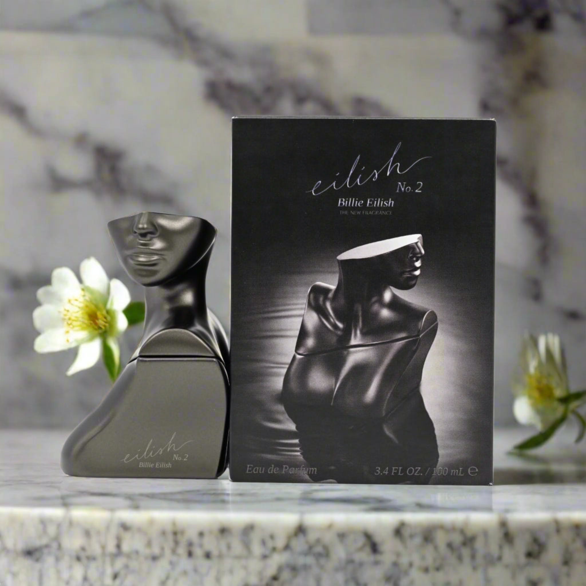 Perfume bottle and packaging with a marble background