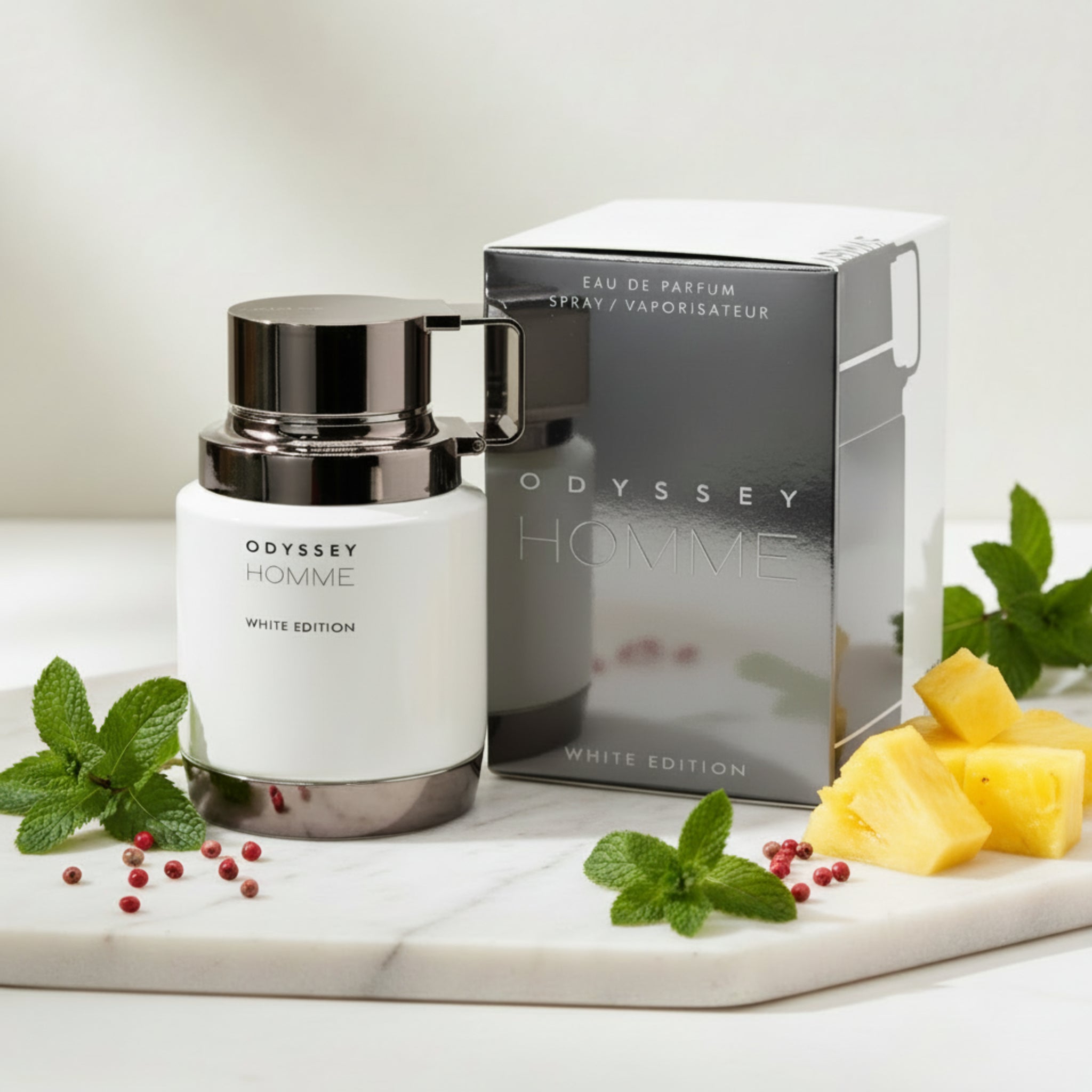 Odyssey Homme White Edition perfume bottle and packaging on a white background