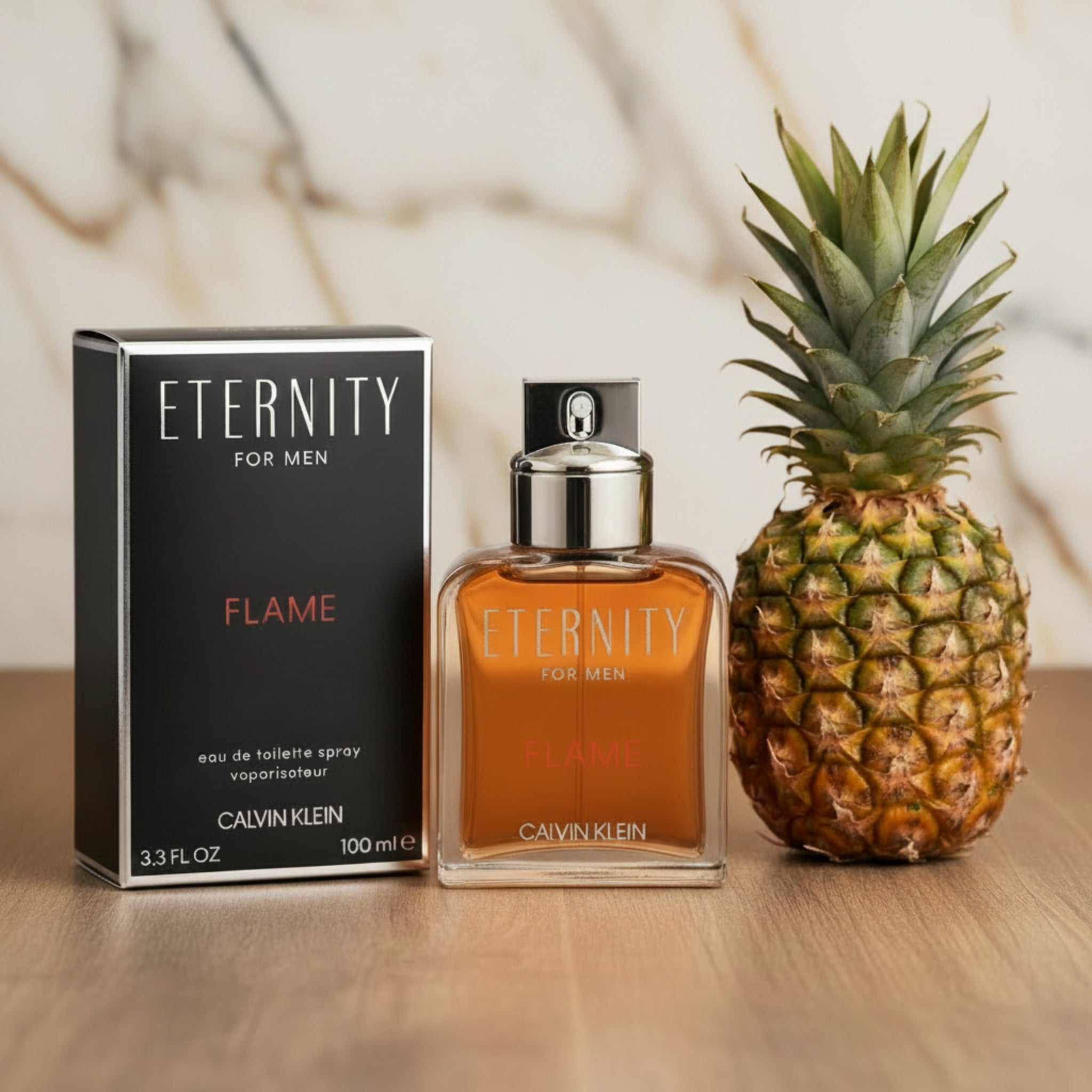 Calvin Klein Eternity for Men Flame perfume bottle and packaging on a white background